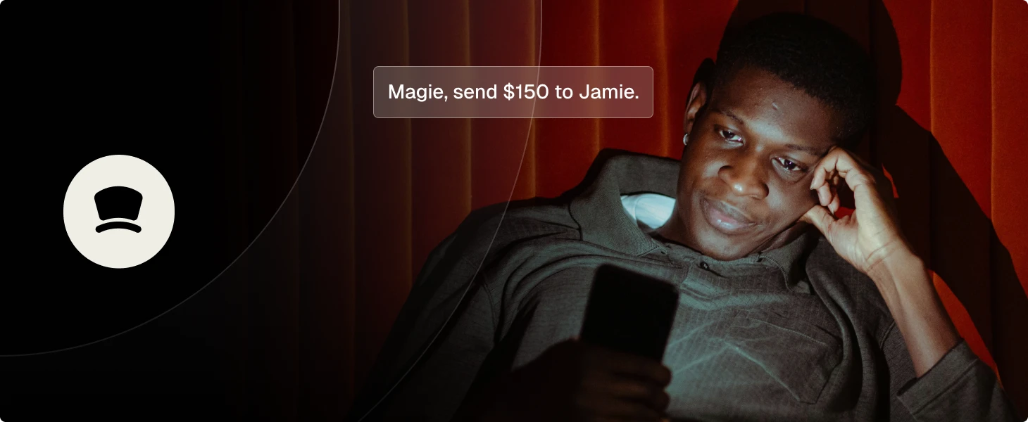 Person looking at a phone with text on screen saying, 'Magie, send $150 to Jamie.'