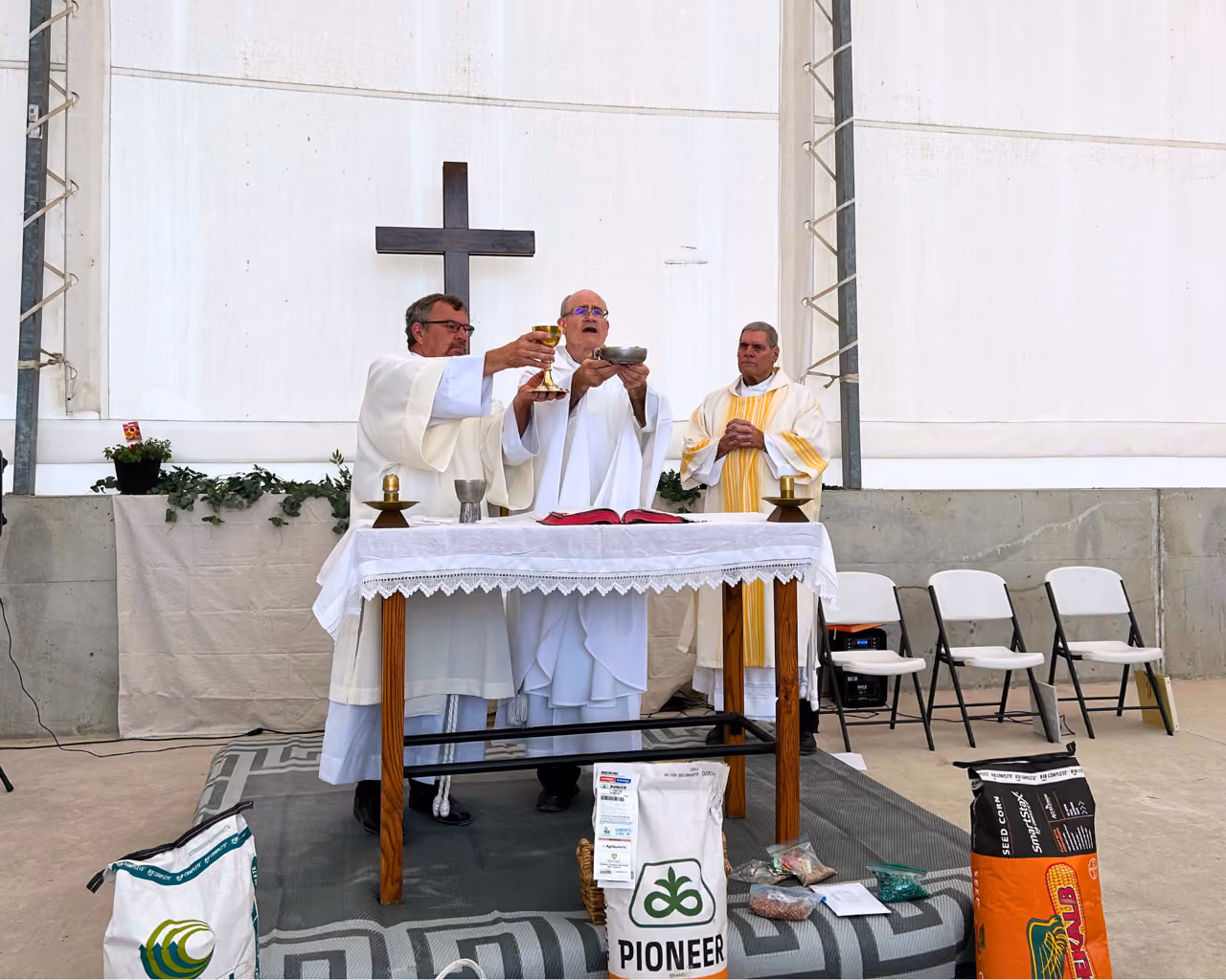 Congregation Feels the Holy Spirit in the Wind During Mass, Blessing of Seeds on Iowa Family Farm