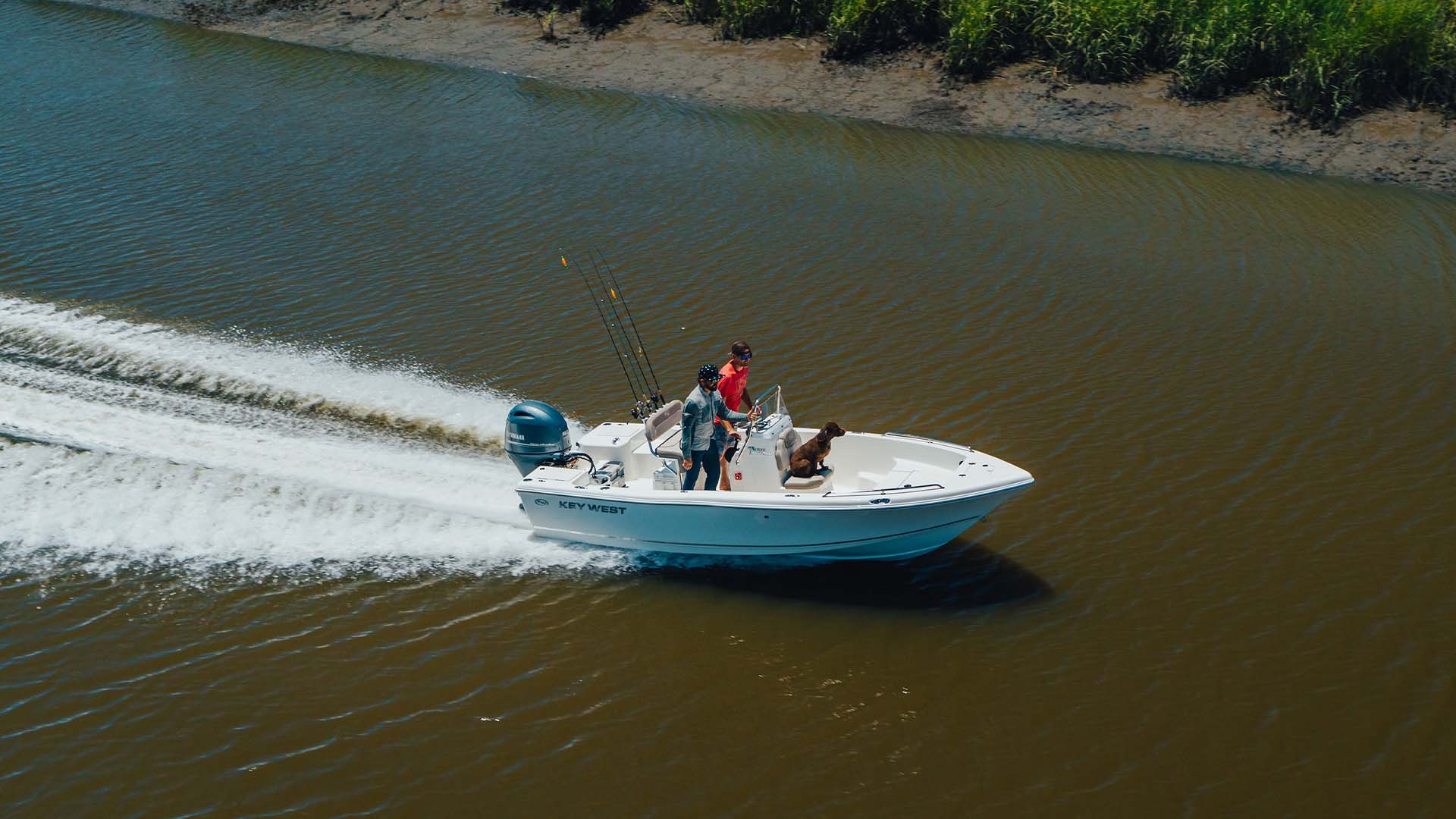 A fast moving boat from an aerial vantage point.