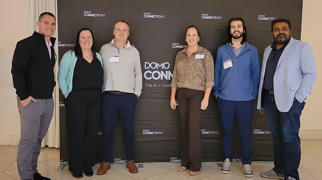 MAU technology team at a Domo Connections AI and data conference — investing in education and innovation