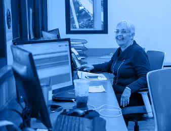 MAU professionals in an office setting — career development at a people-first staffing company