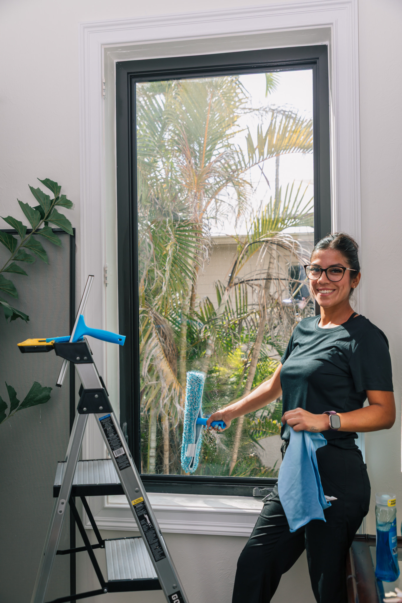 Sparklean team cleaning windows in Naples luxury home