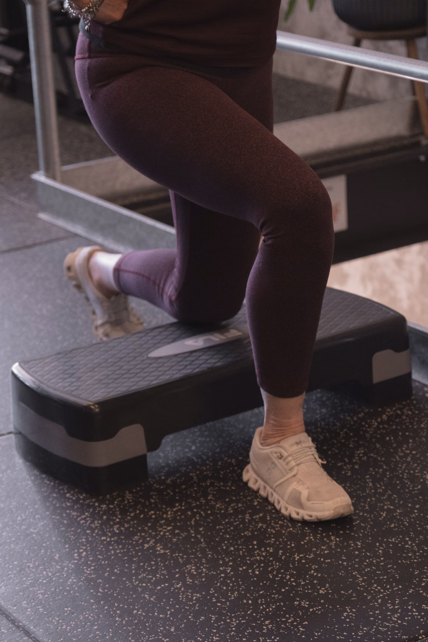 Step-up exercise onto a platform in a Bones & Balance class