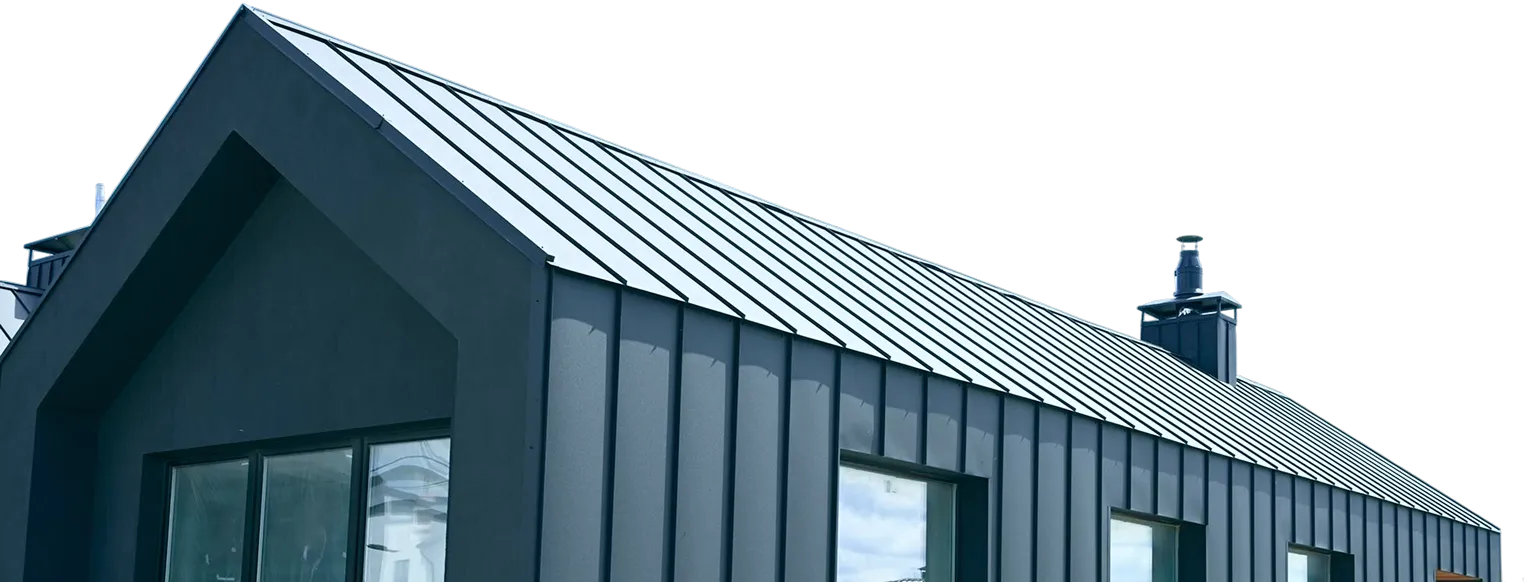 Modern house roof and upper wall with vertical metal paneling and multiple windows.