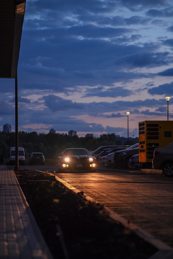 A couple of cars that are sitting in the street