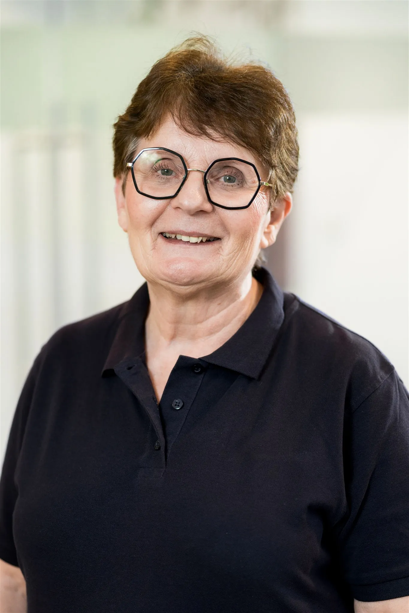 Portrait von einer Mitarbeiterin.