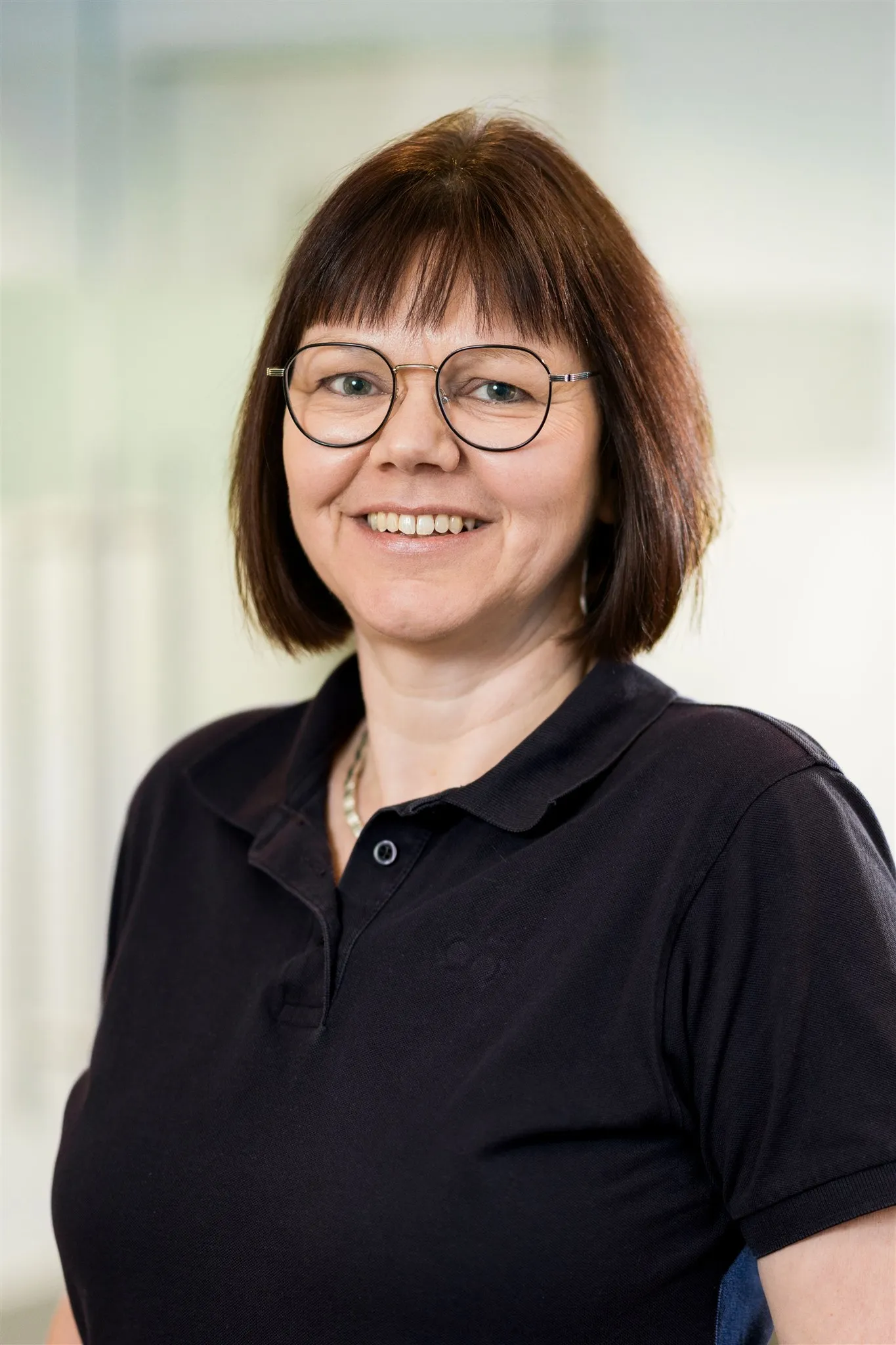 Portrait von einer Mitarbeiterin.