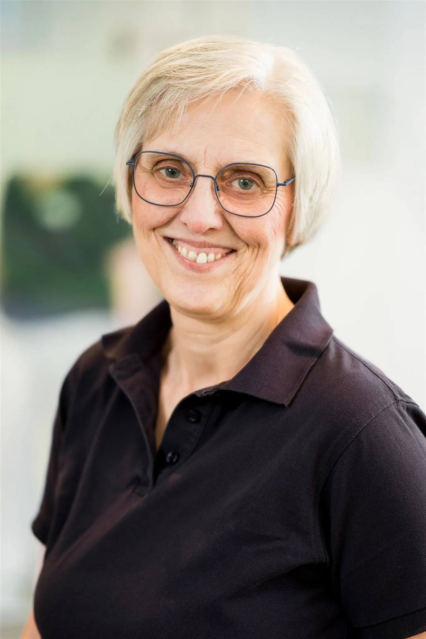Portrait von einer Mitarbeiterin.