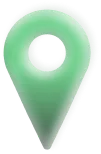 Grüner Standortmarker mit Schatteneffekt vor weißem Hintergrund.