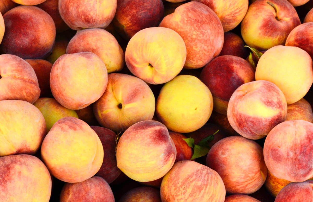 A pile of peaches from the Markets at Shrewsbury are seen during Peach Days in Glen Rock, Pennsylvania.