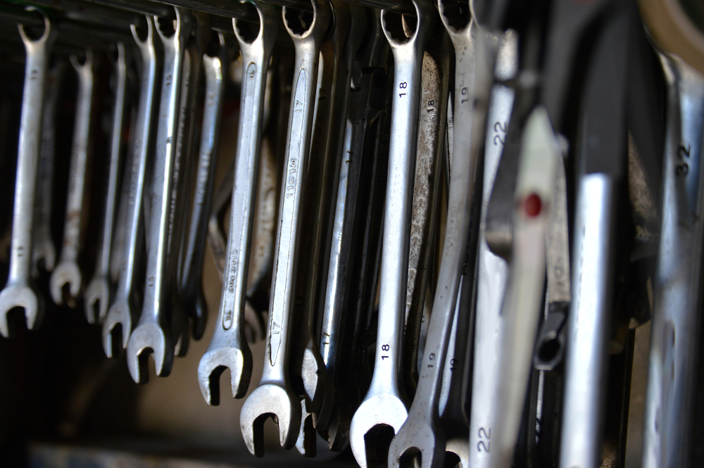 Row of wrenches hung up in a garage|Real Man's Yard Sale is happening on August 5, 2023 at the Markets at Shrewsbury.||A poster for the Real Man's Yard Sale being held at the Markets at Shrewsbury in Glen Rock, York County, Pennsylvania.
