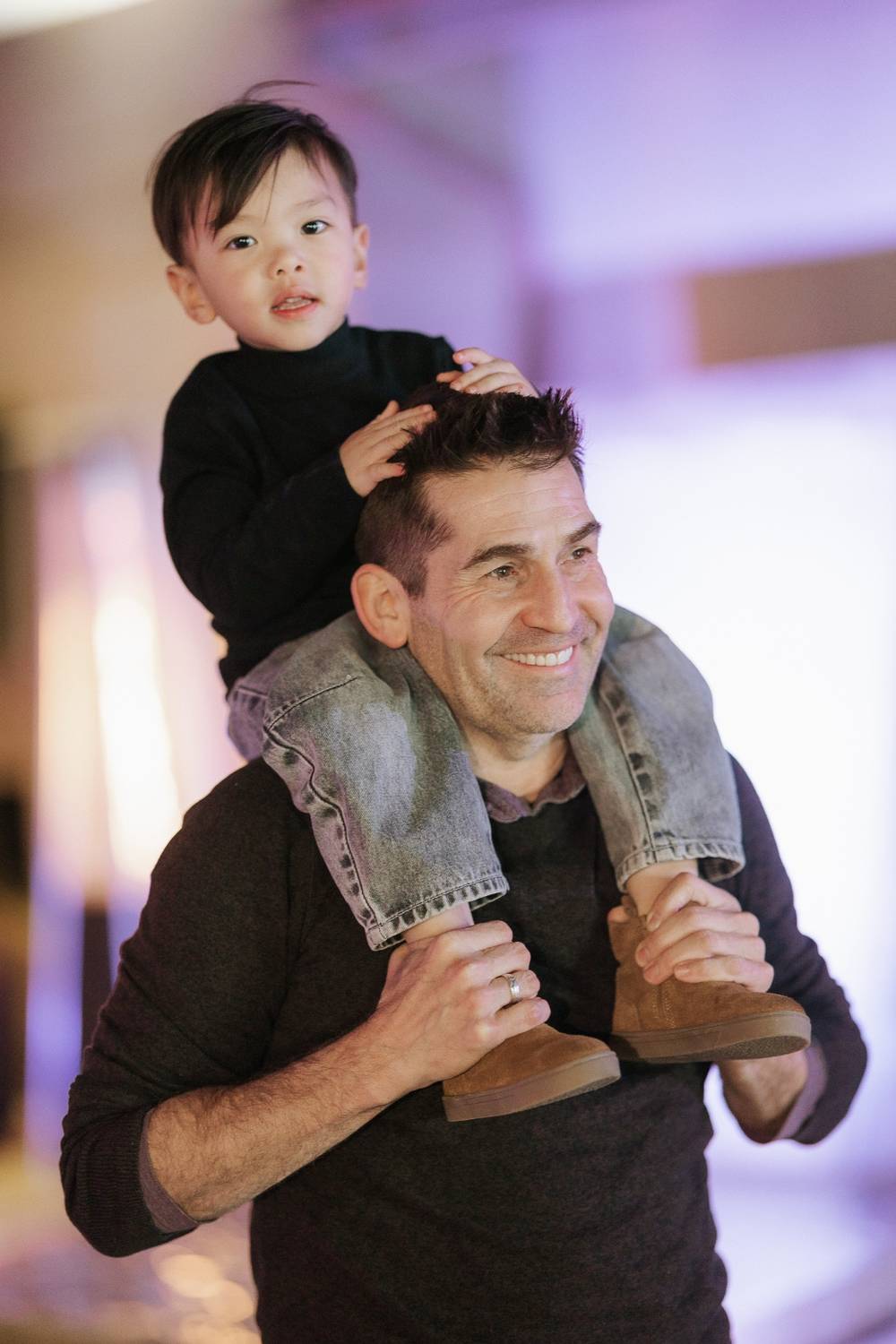 Todd Dunphy with a child on his shoulders
