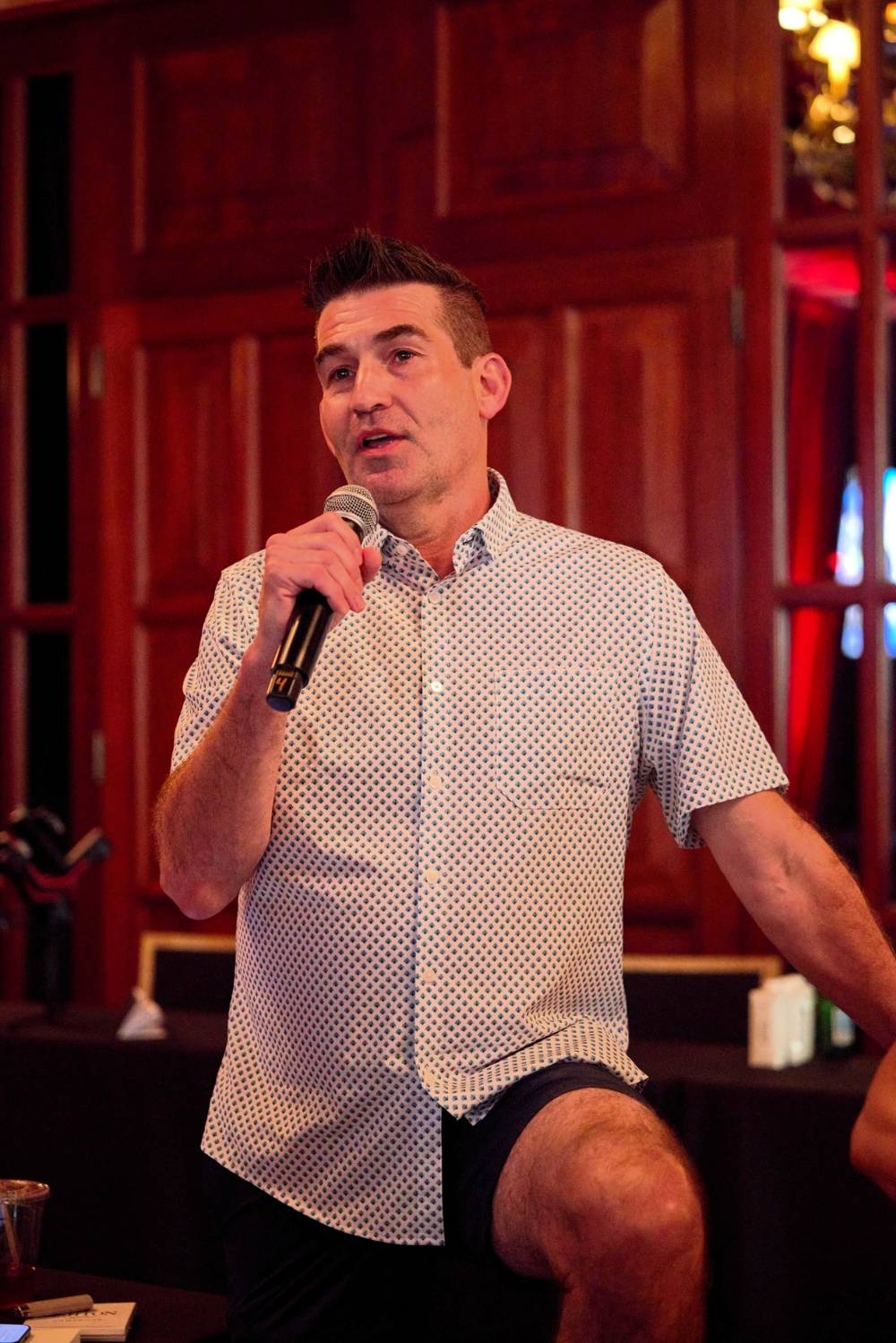 Todd Dunphy speaking with a microphone