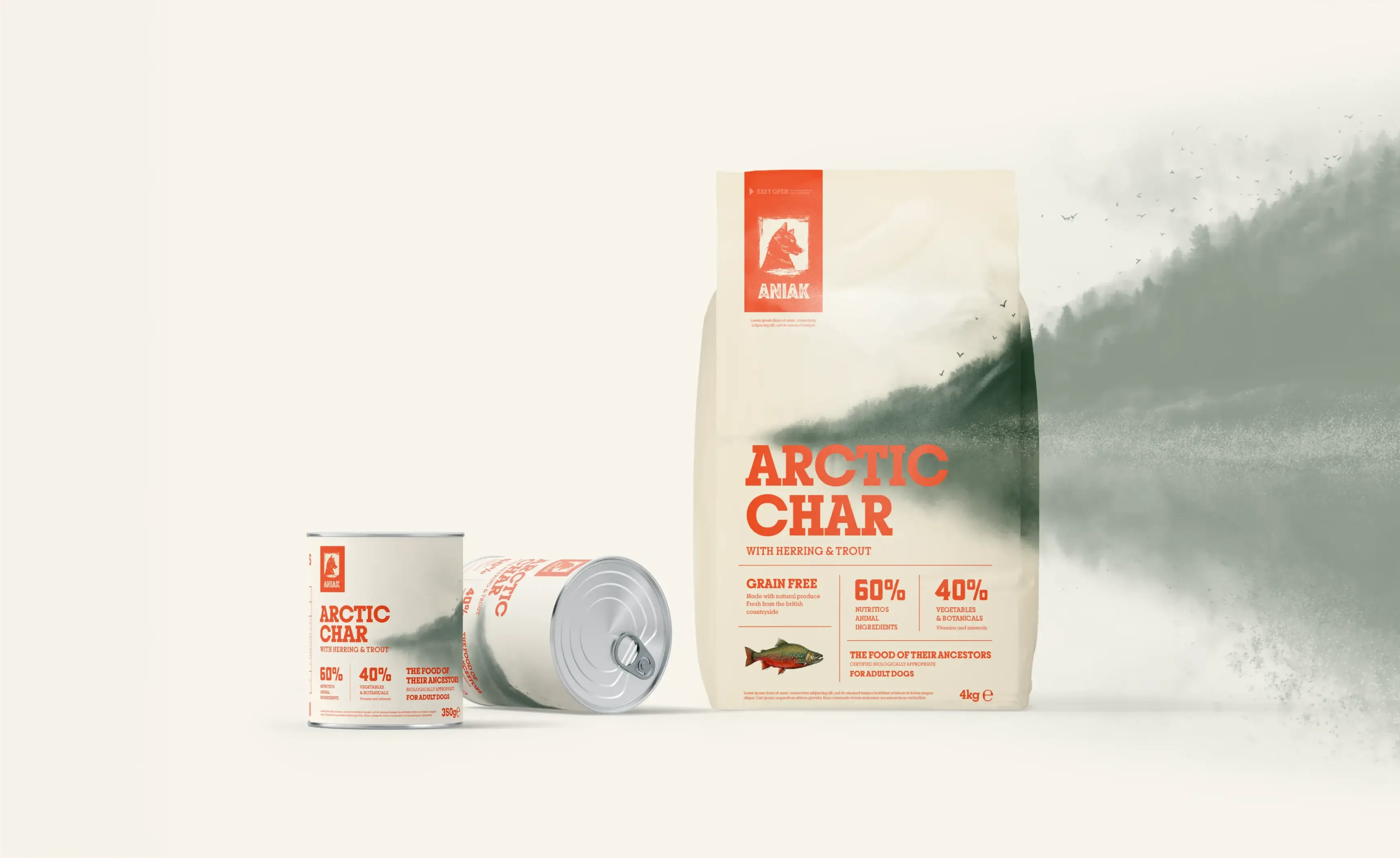 Arctic Char dog food packaging in cans and a bag with a green mountain design and orange text.