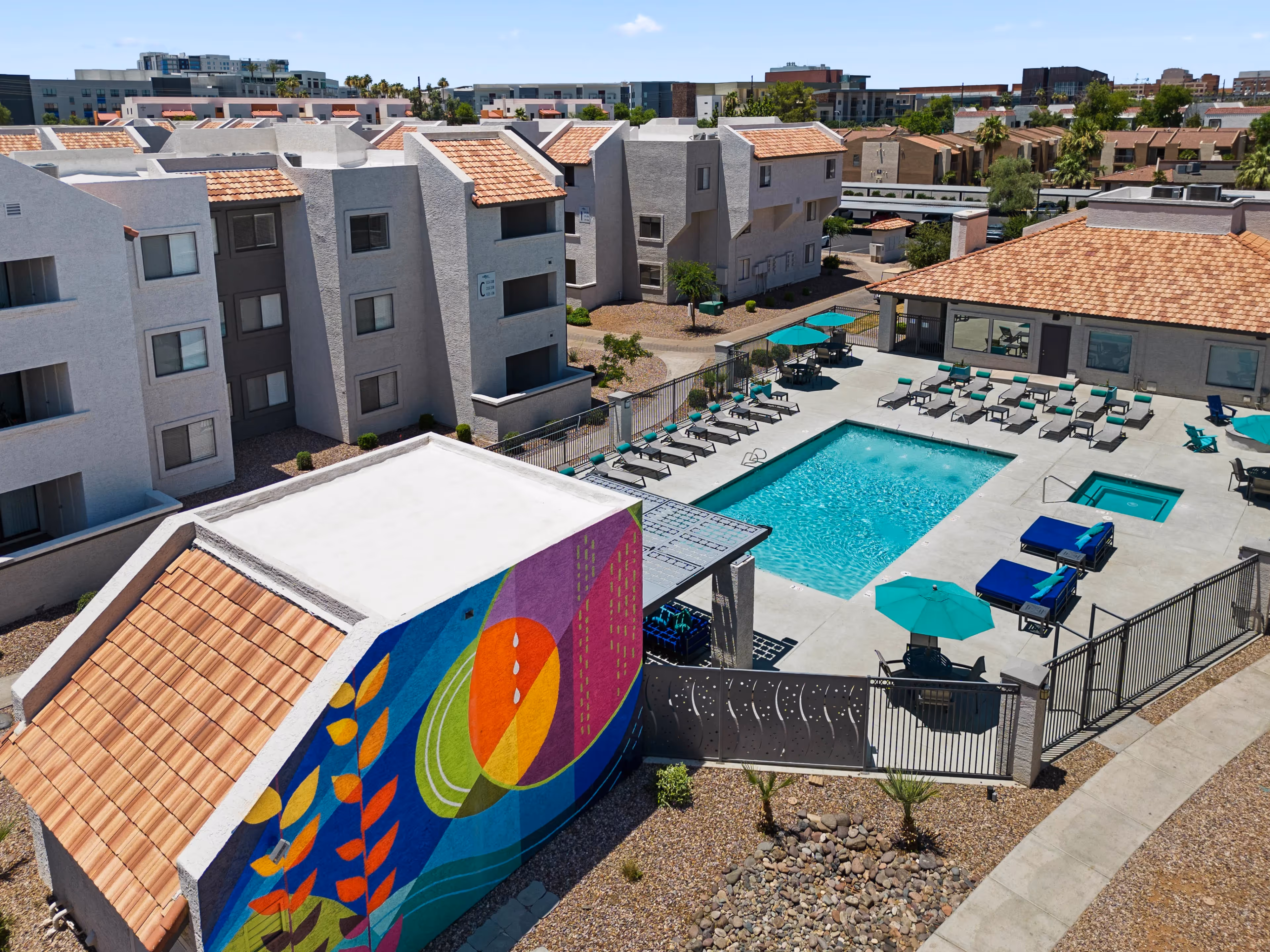 Birds eye view of Paseo swimming pool with mural property art