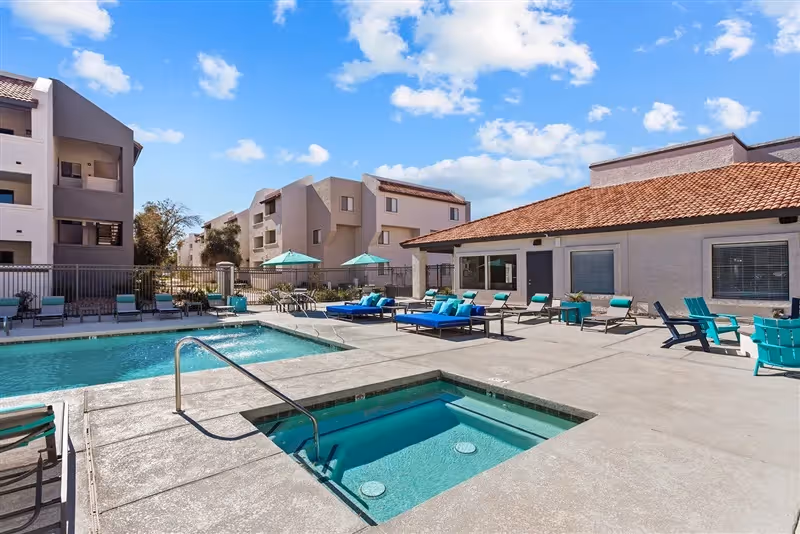 Swimming pool with hot tub