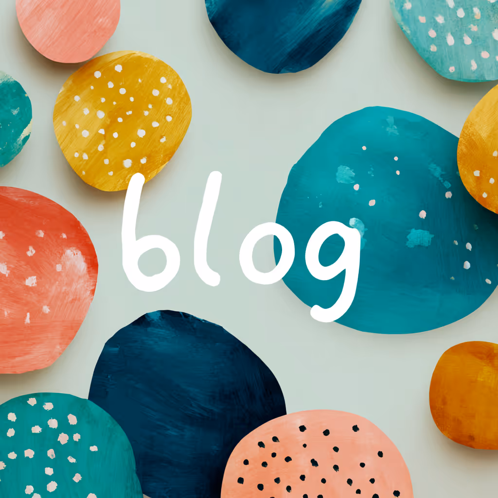 Abstract colorful rounded shapes with white handwritten text 'blog' in the center on a light background.