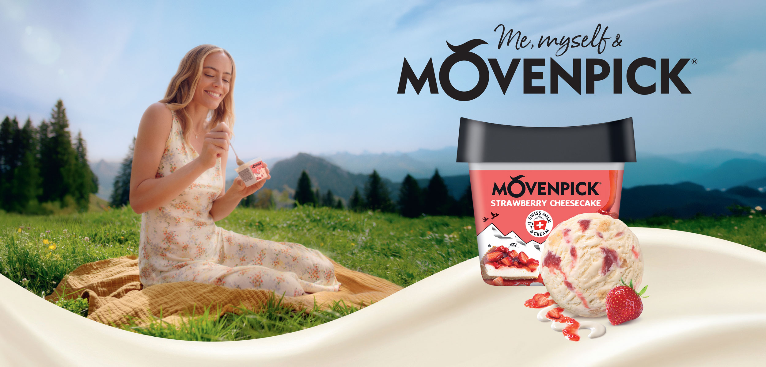 Mövenpick Ice Cream Sujet: Frau isst Glace in Schweizer Berglandschaft