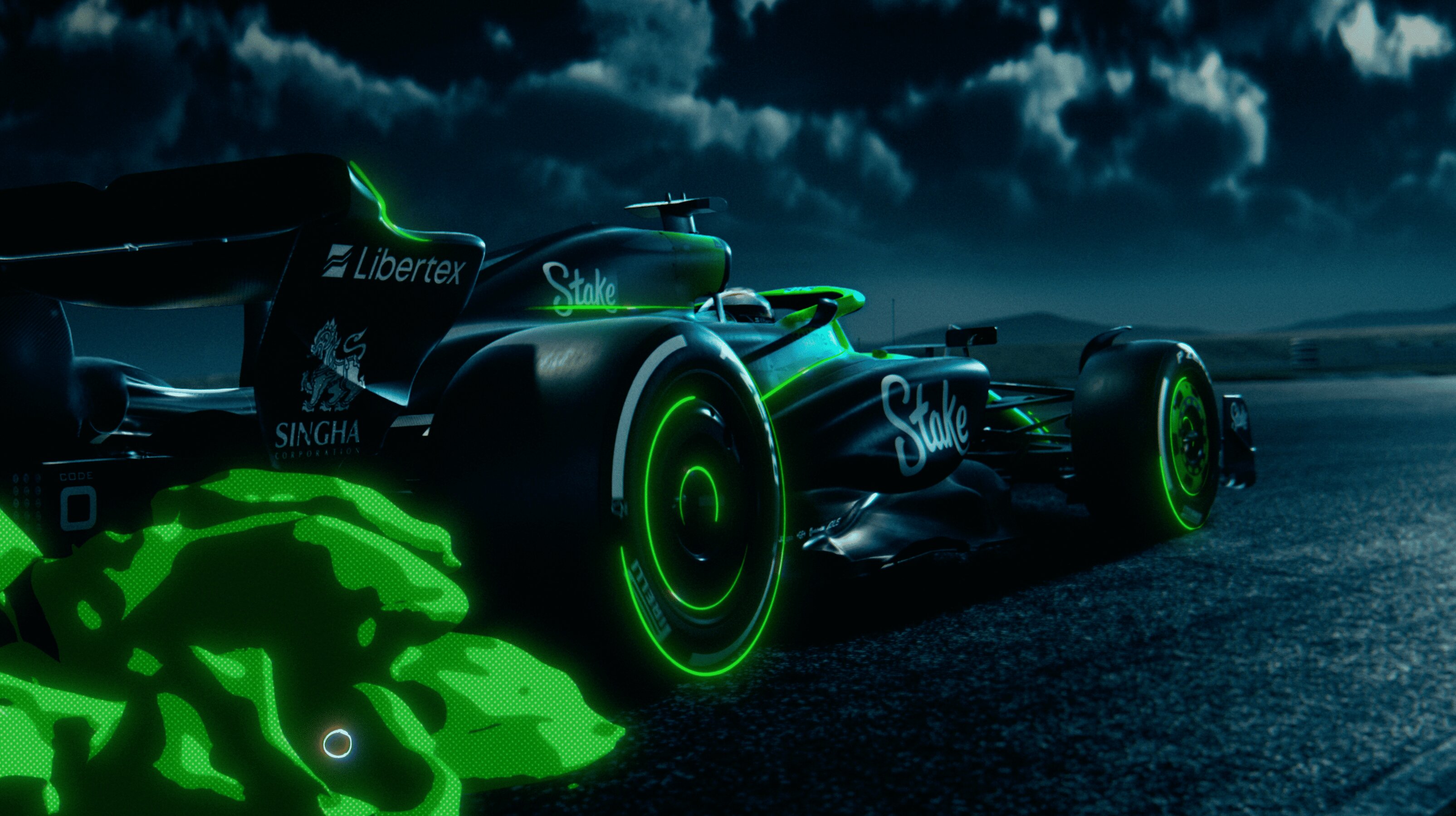 Bolide des Stake F1 Team KICK Sauber in der Boxengasse bei Nacht