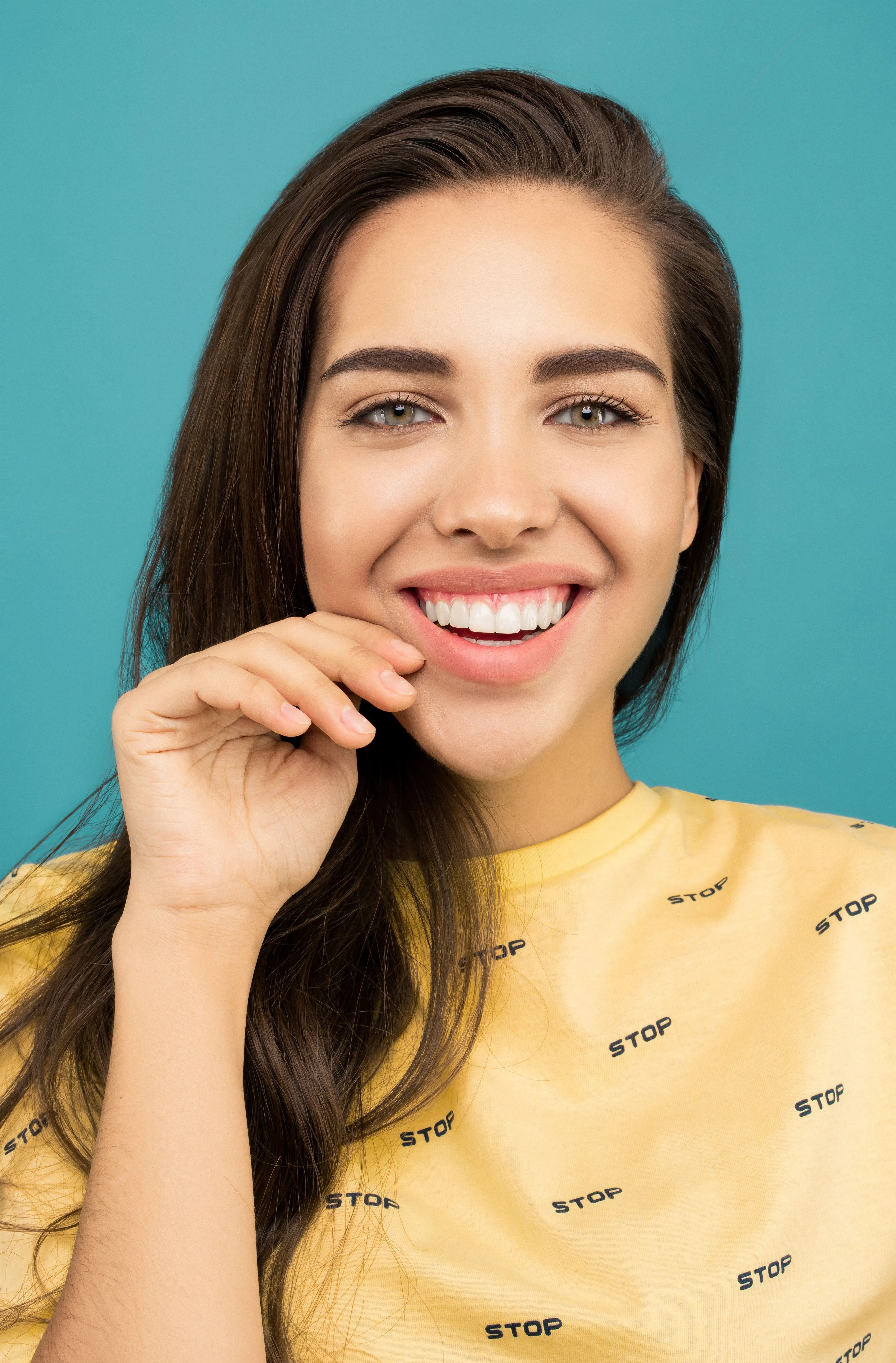 Smiling woman showing her teeth