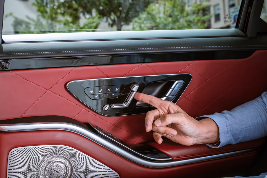 Seat control detail inside the Mercedes S-Class for personalized rear passenger comfort