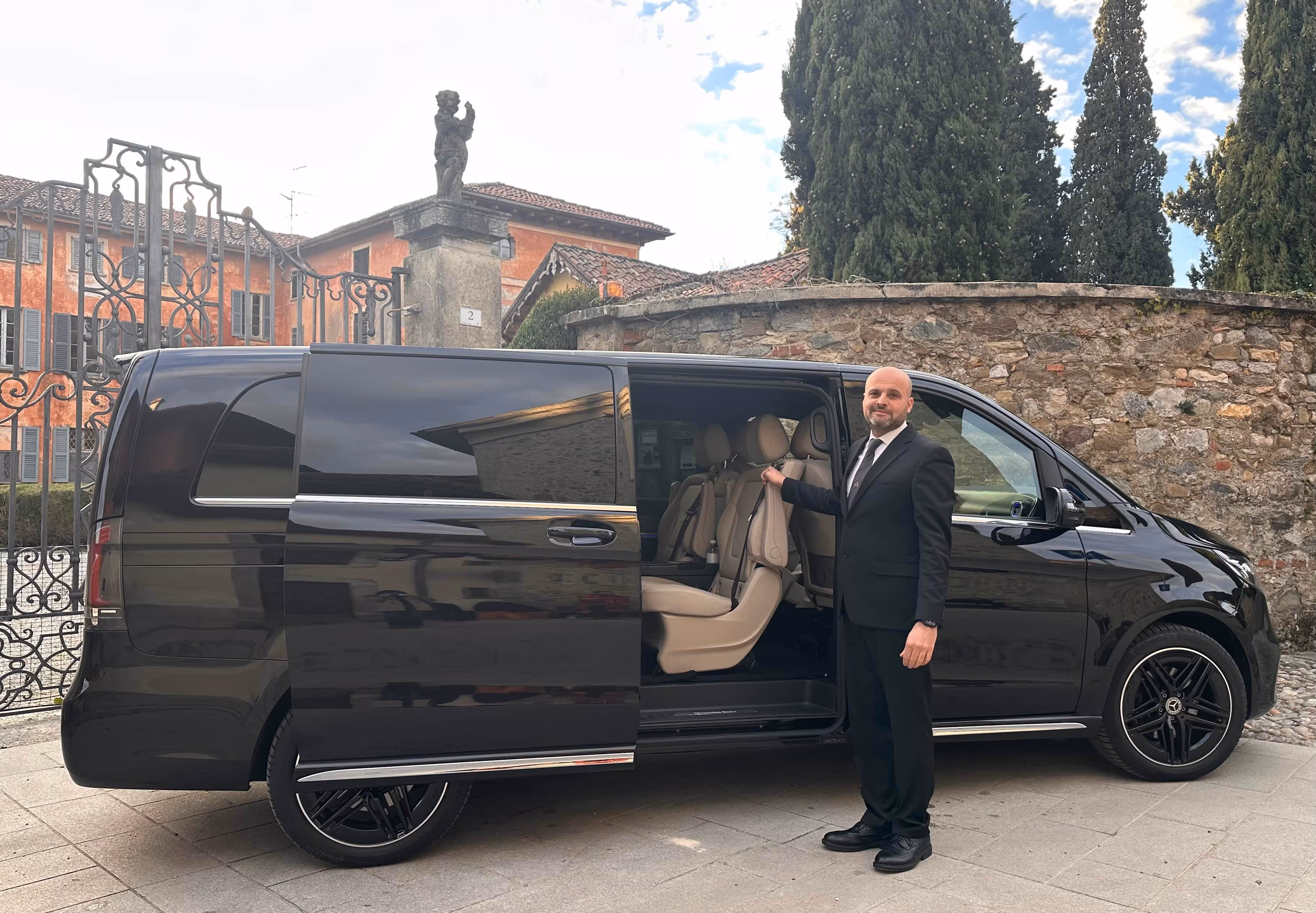 Mercedes V-Class with light interior and chauffeur for premium family and group transfers