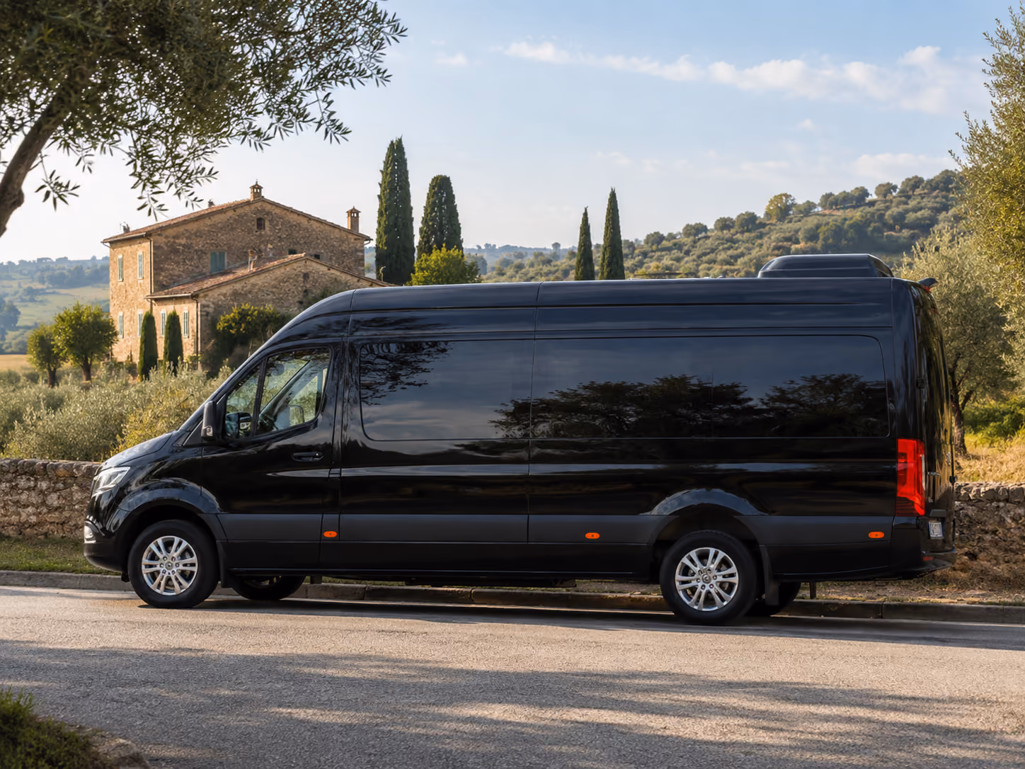 Side exterior view of the Mercedes Sprinter Van 8 for private transfers and leisure routes