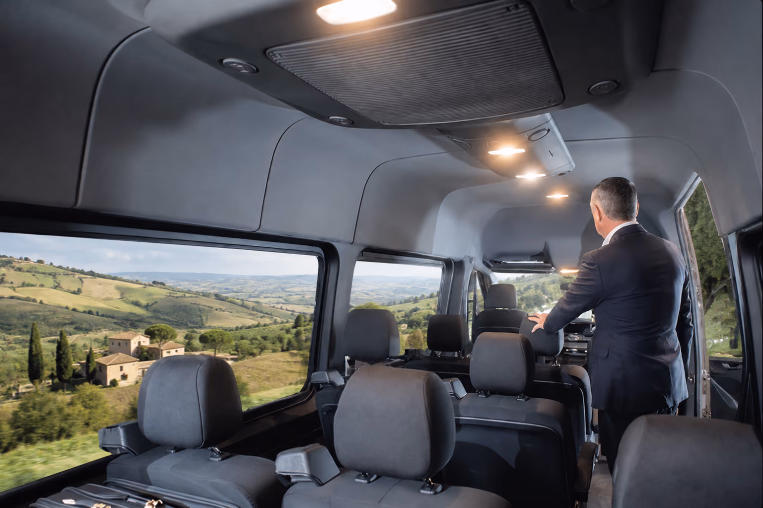 Onboard chauffeur service inside the Mercedes Sprinter Van 8 for premium group travel