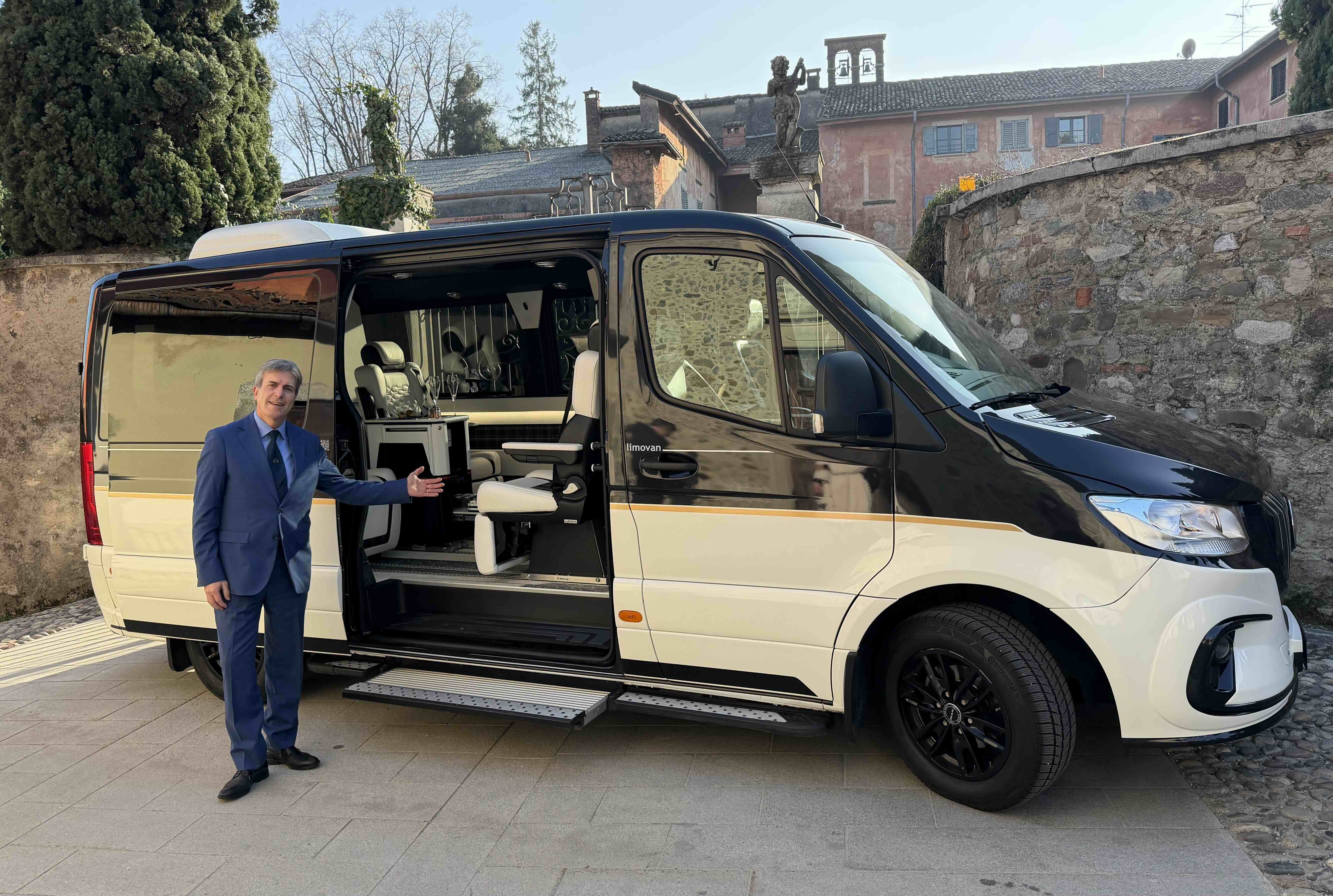 Moveolux Limovan Portofino exterior with chauffeur for premium private group transfers