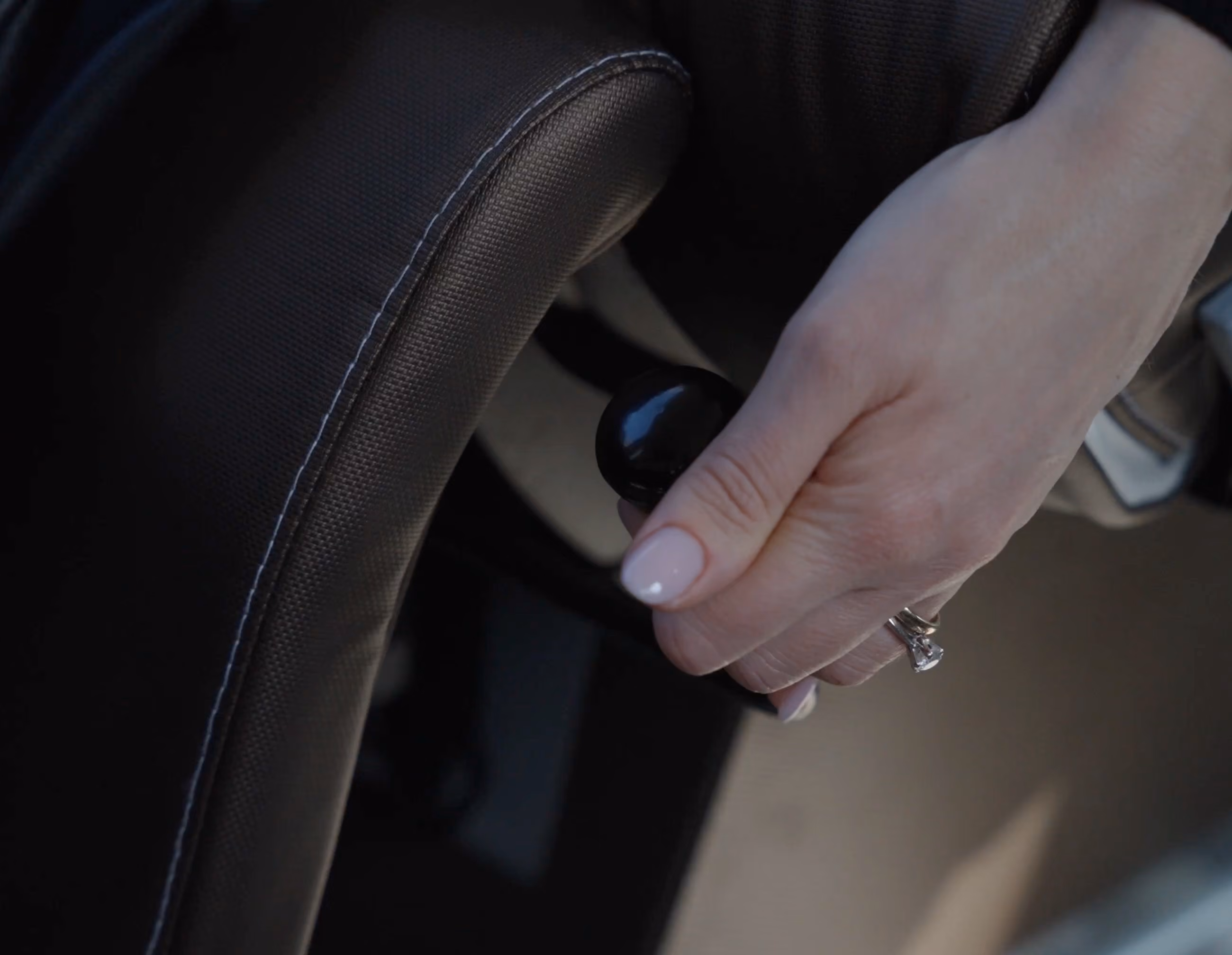 Seat control detail inside the Moveolux Limovan Light Edition for personalized passenger comfort