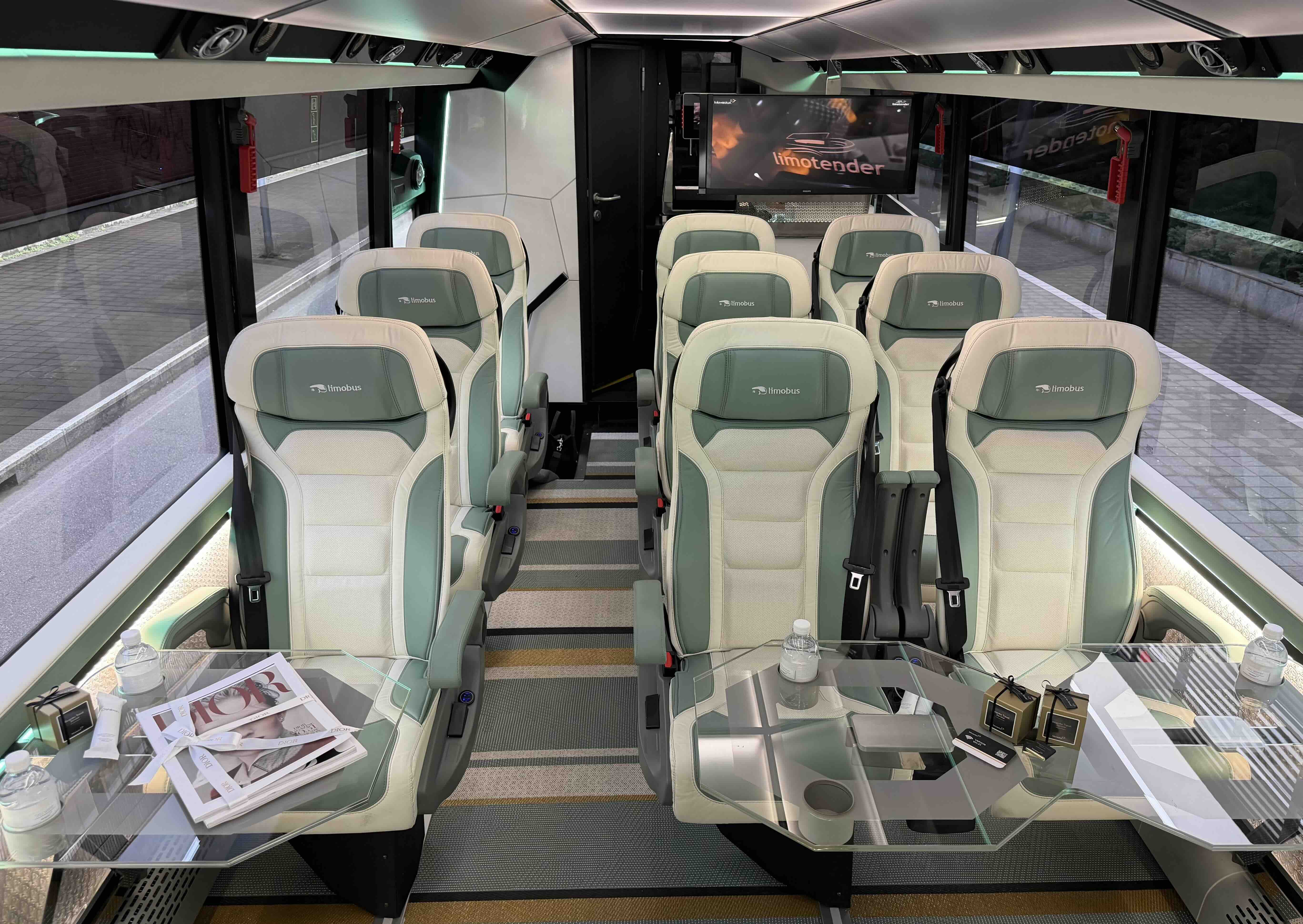 Interior table setup inside the Moveolux Limobus Seabreeze 18 for VIP group hospitality