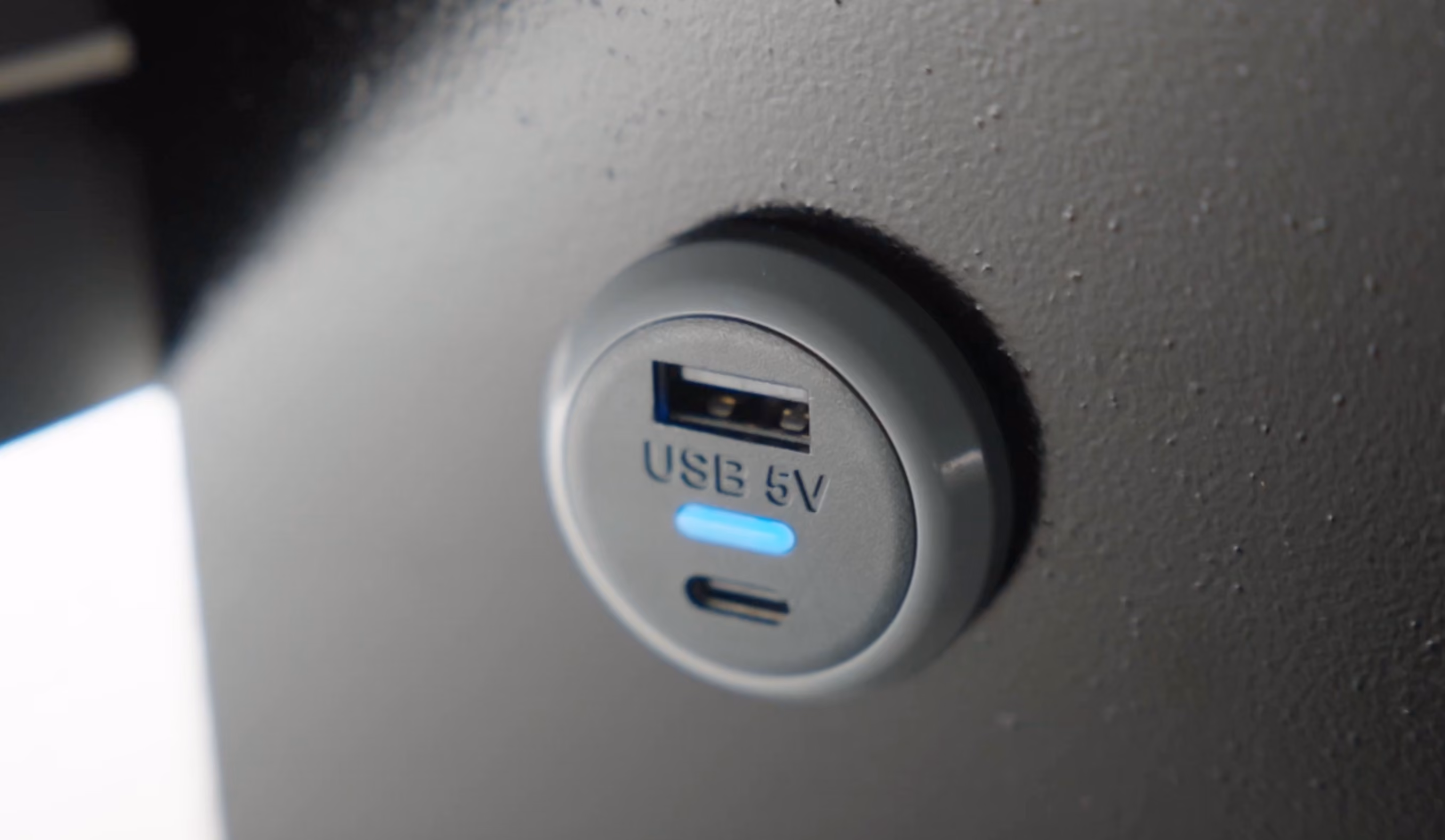 USB charging detail on board the Moveolux Limobus Elements 20 for connected group travel