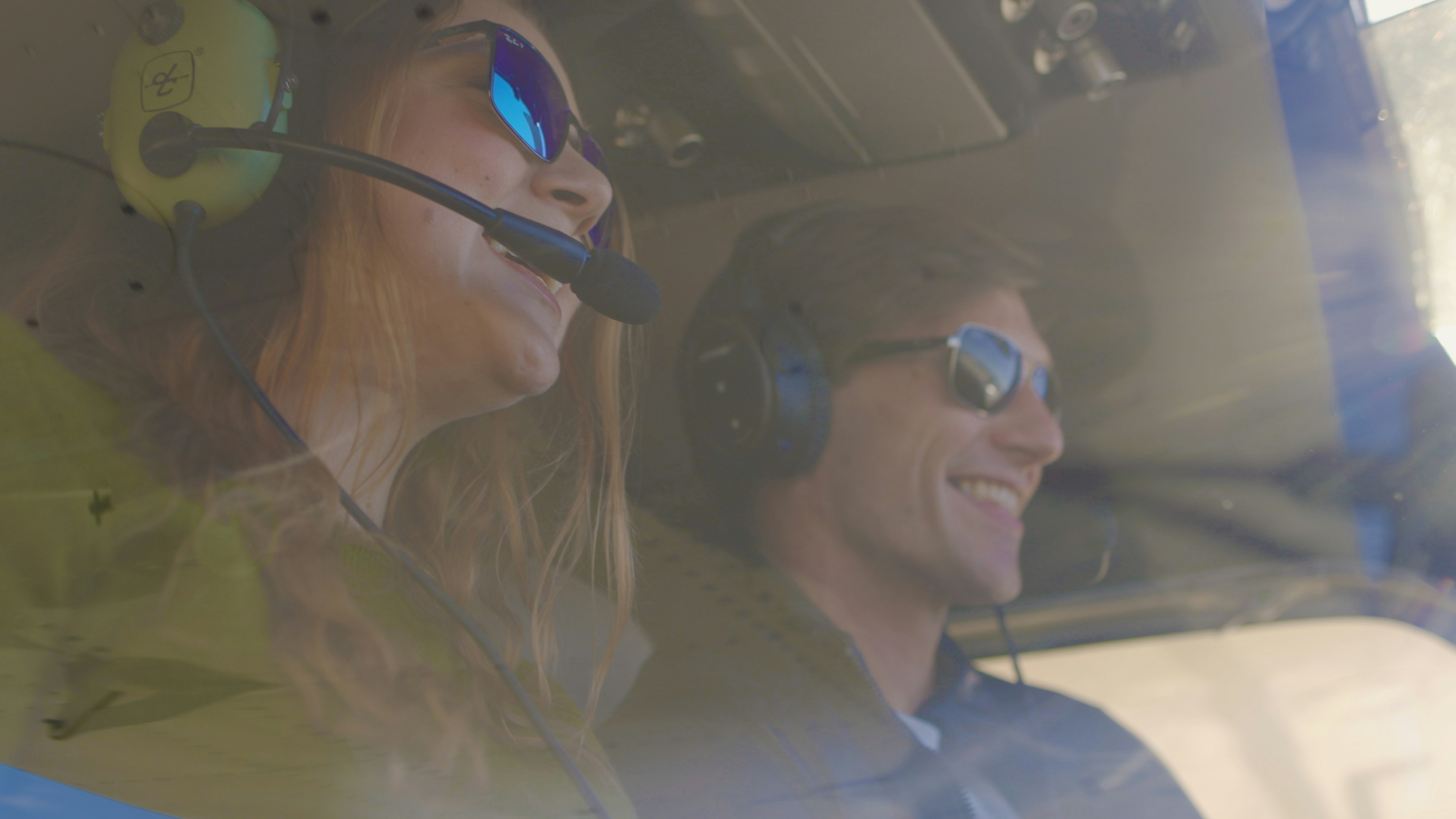 Passengers enjoying a private flight experience aboard the Airbus H125 helicopter