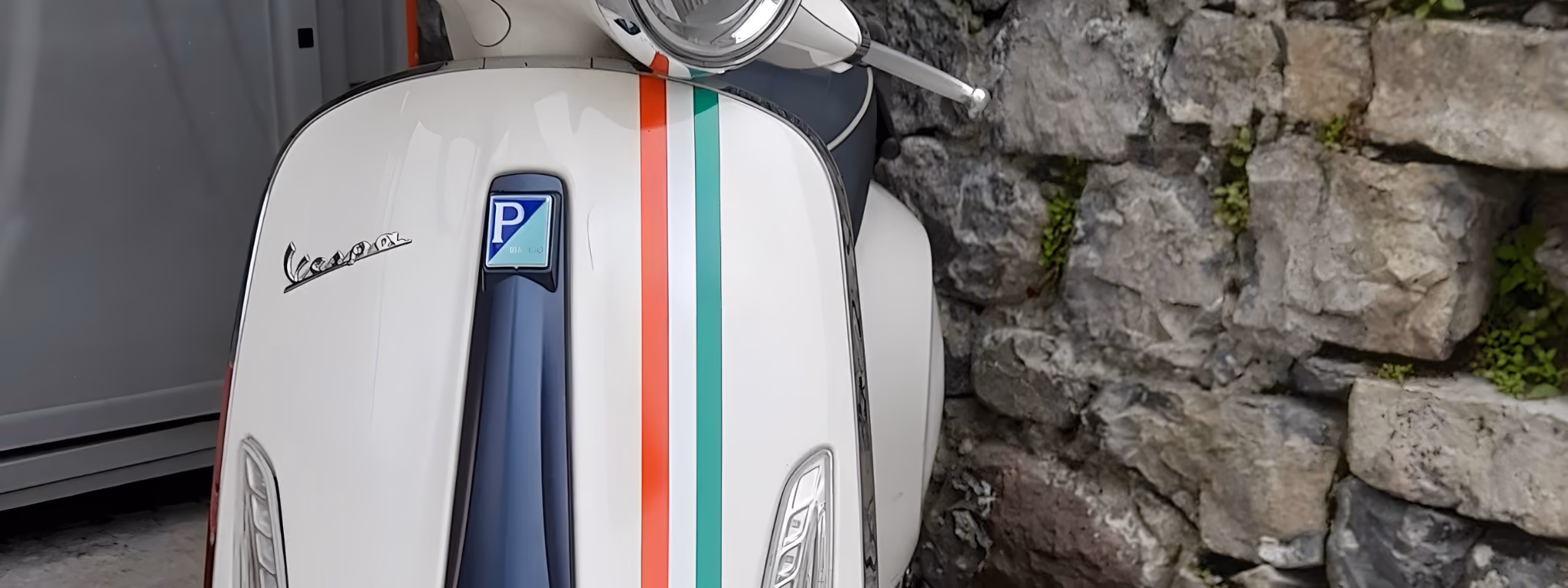 Close-up detail of the Vespa Primavera 125 for premium scooter rental on Lake Como