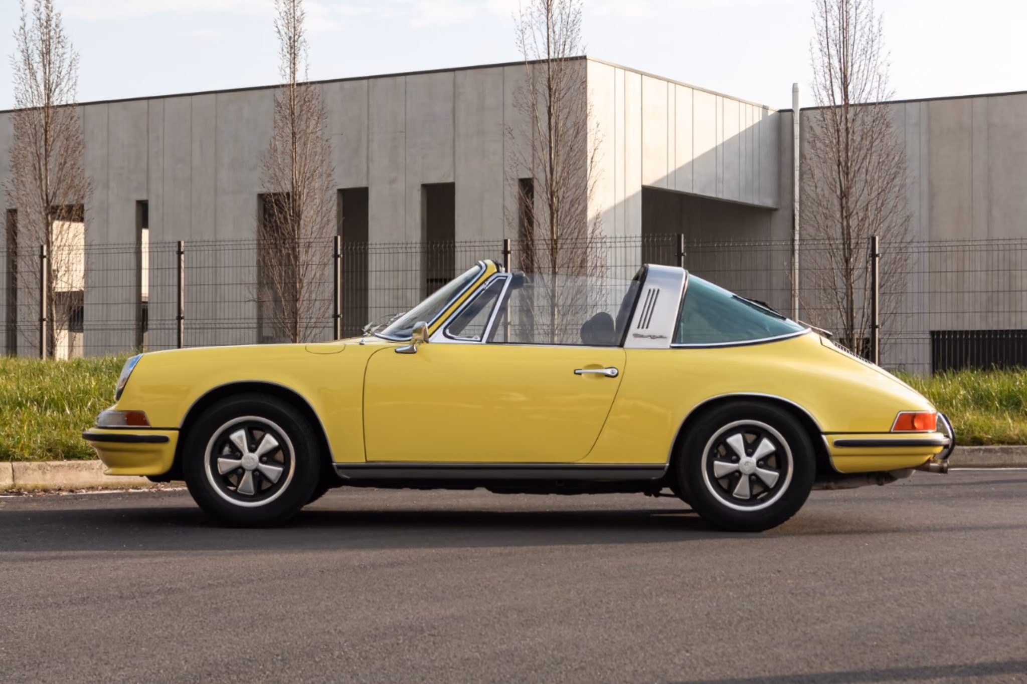 Yellow Porsche 911 S Classic Targa side profile for open-air collector-style driving
