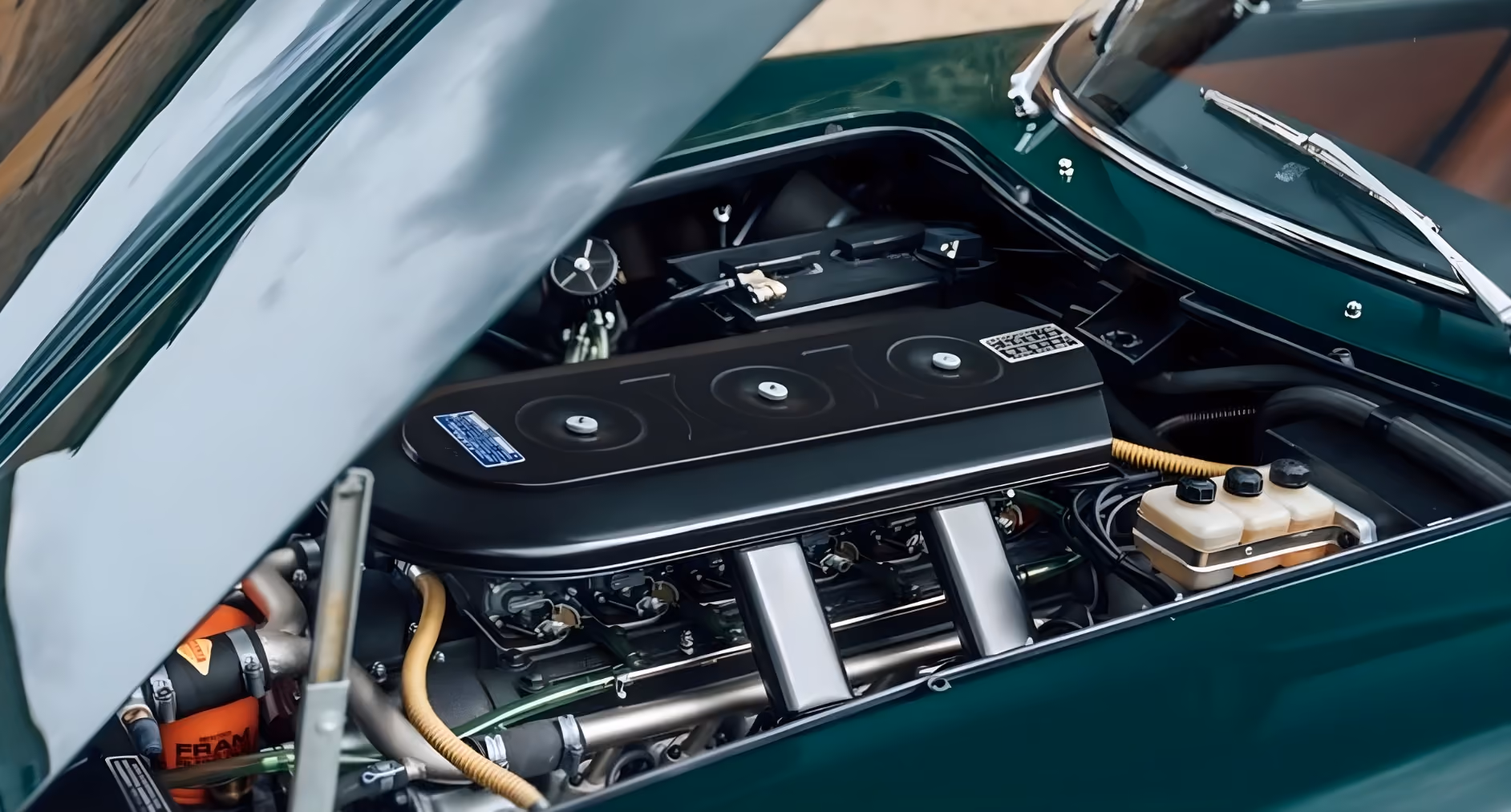 Engine detail of the Ferrari 275 GTB for a rare classic collector car experience