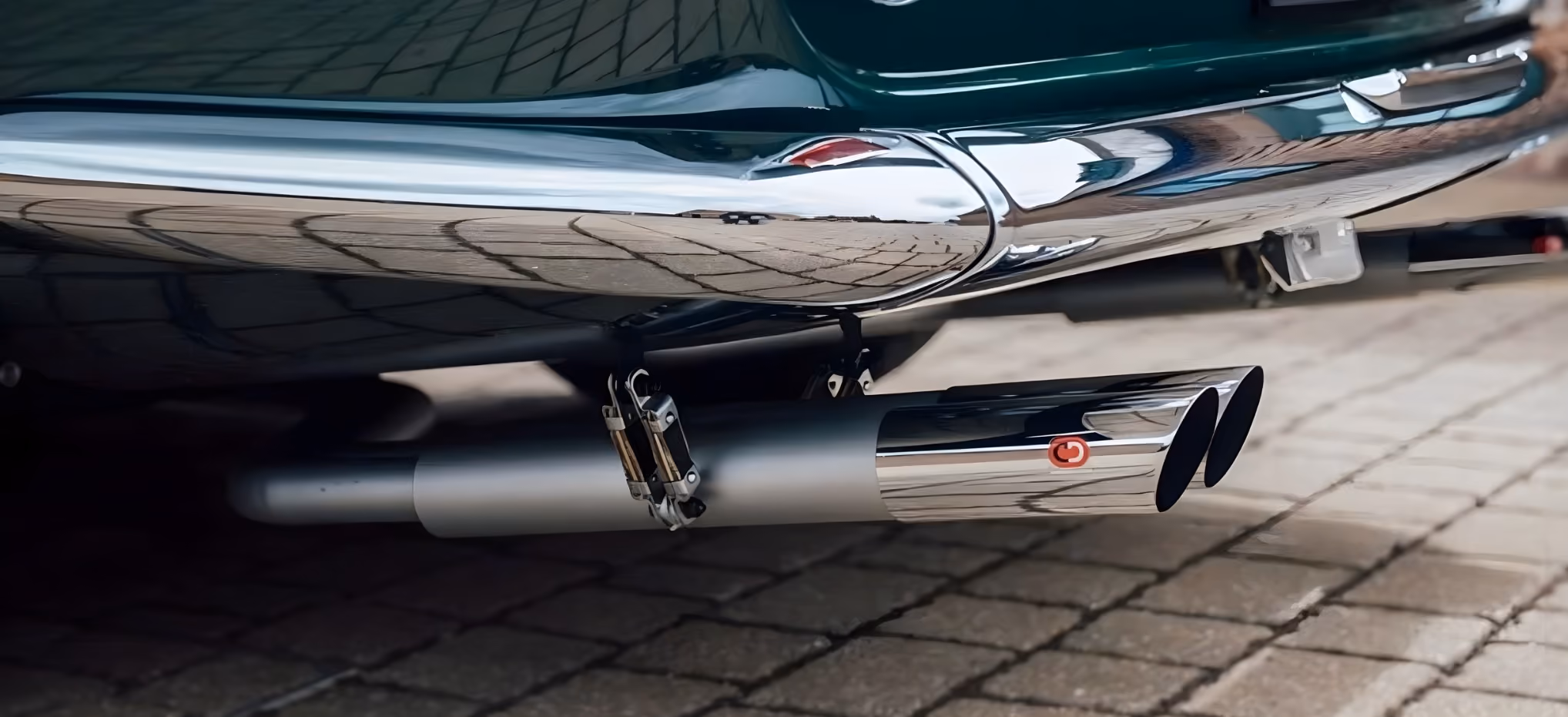 Rear chrome detail of the Ferrari 275 GTB highlighting its timeless vintage design