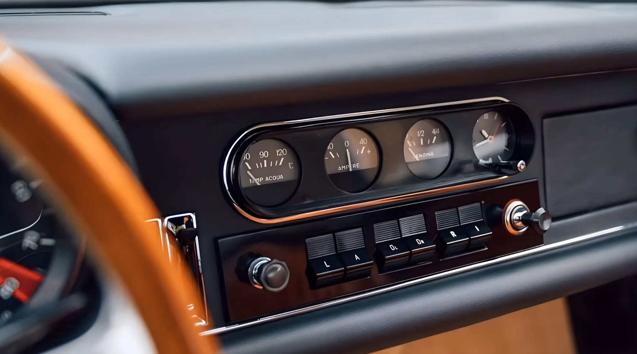 Vintage instrument cluster of the Ferrari 275 GTB with classic analog gauges