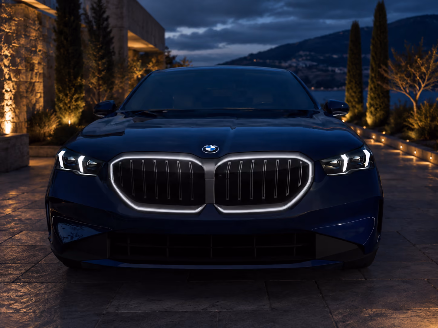 BMW Executive Sedan with refined front exterior view for premium self-drive rental at dusk