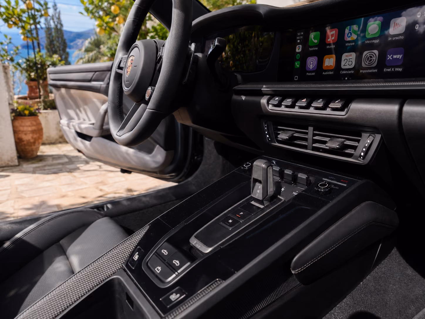 Cockpit and center console of a Porsche iconic convertible car with premium digital display