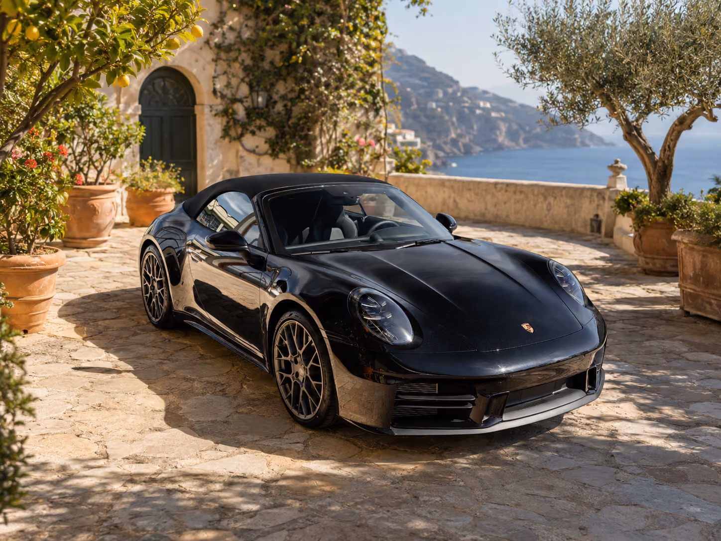 Front side exterior view of a Porsche iconic convertible car for premium self-drive rental