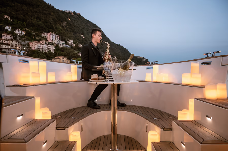 Evening deck service on the Moveolux Limotender for private events and romantic boat tours