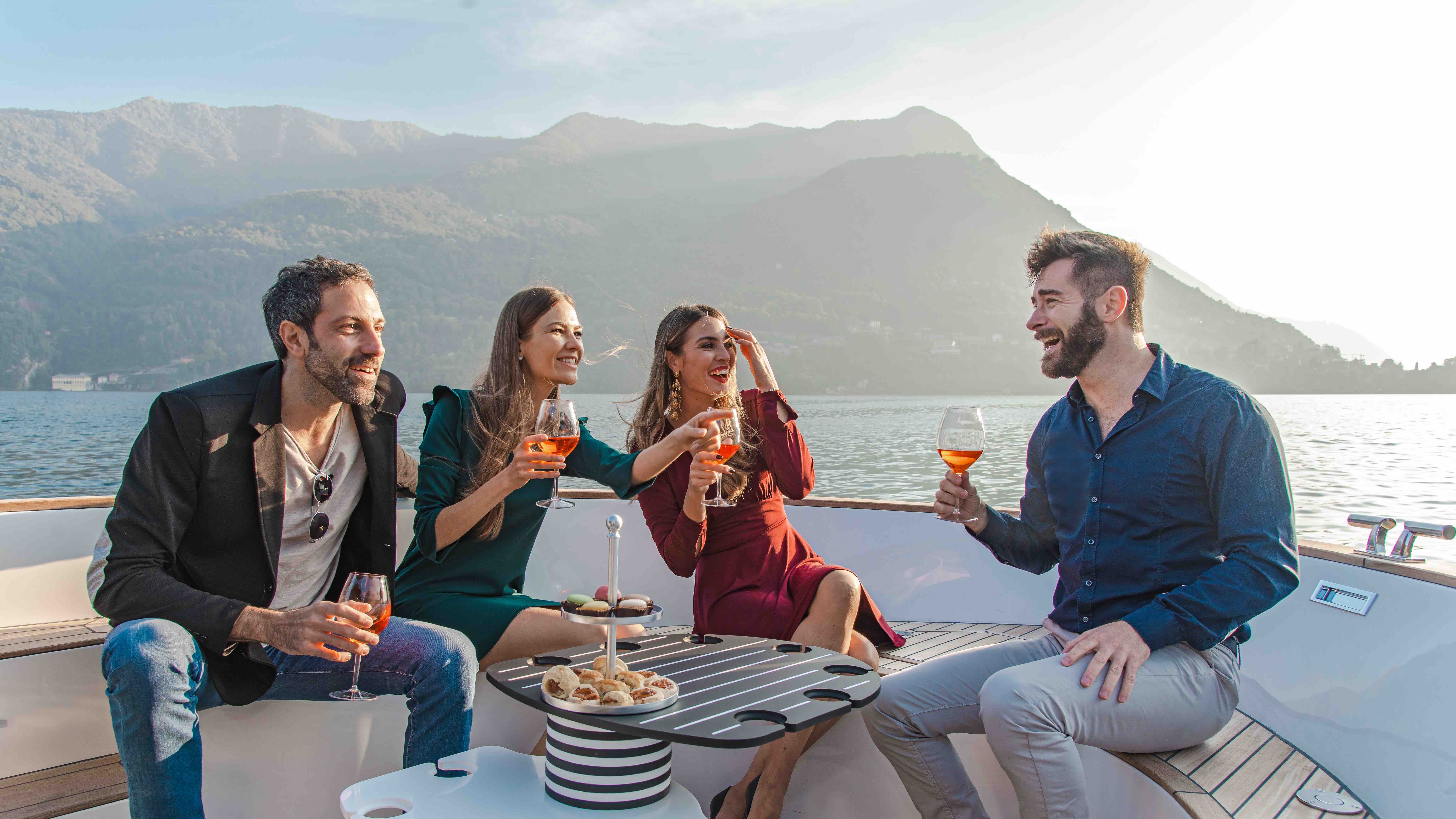 Group aperitif on the Moveolux Limotender deck during an exclusive Lake Como boat tour