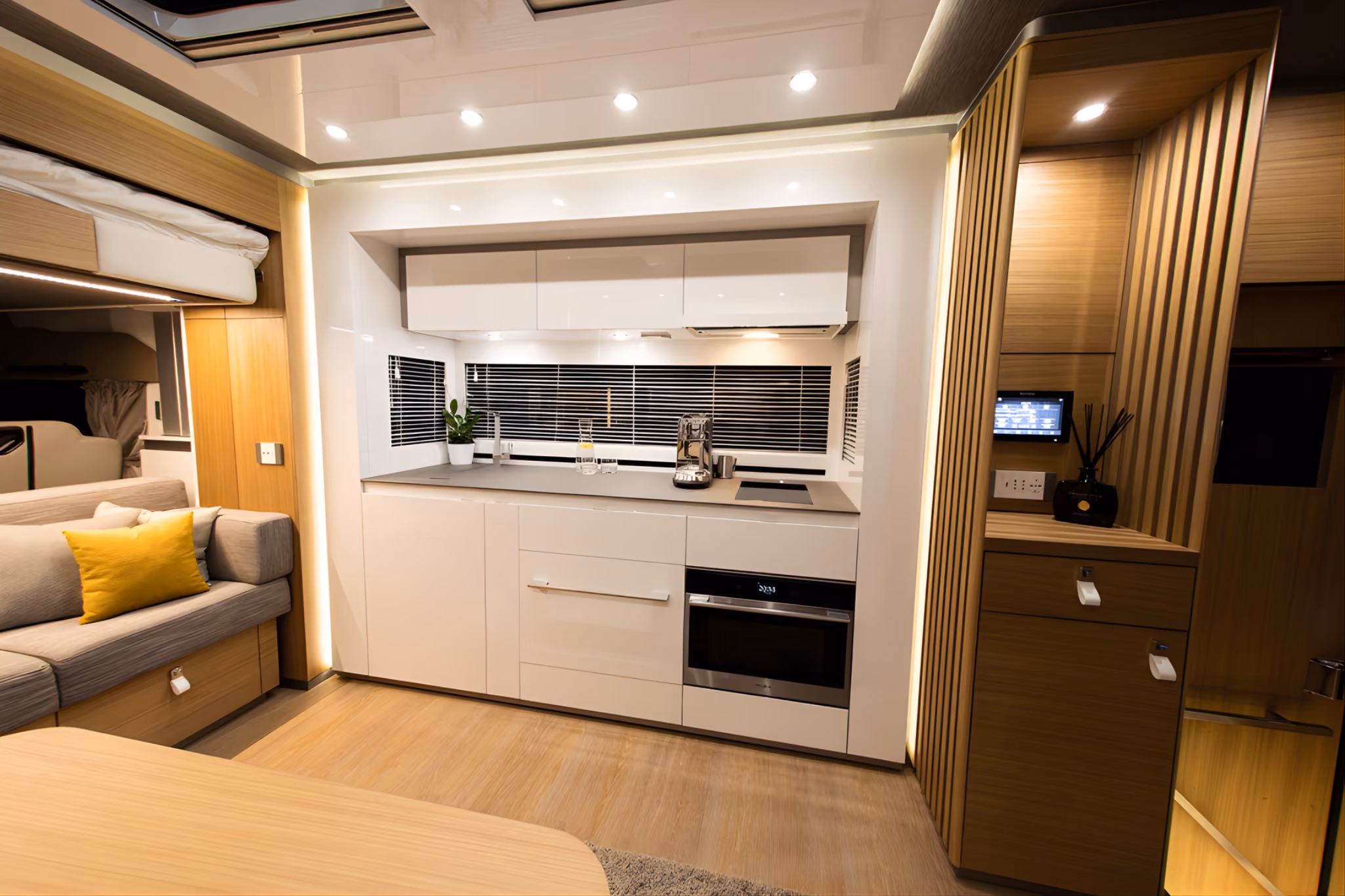 Kitchen interior of the Mercedes Actros STX luxury motorhome for private travel and event support