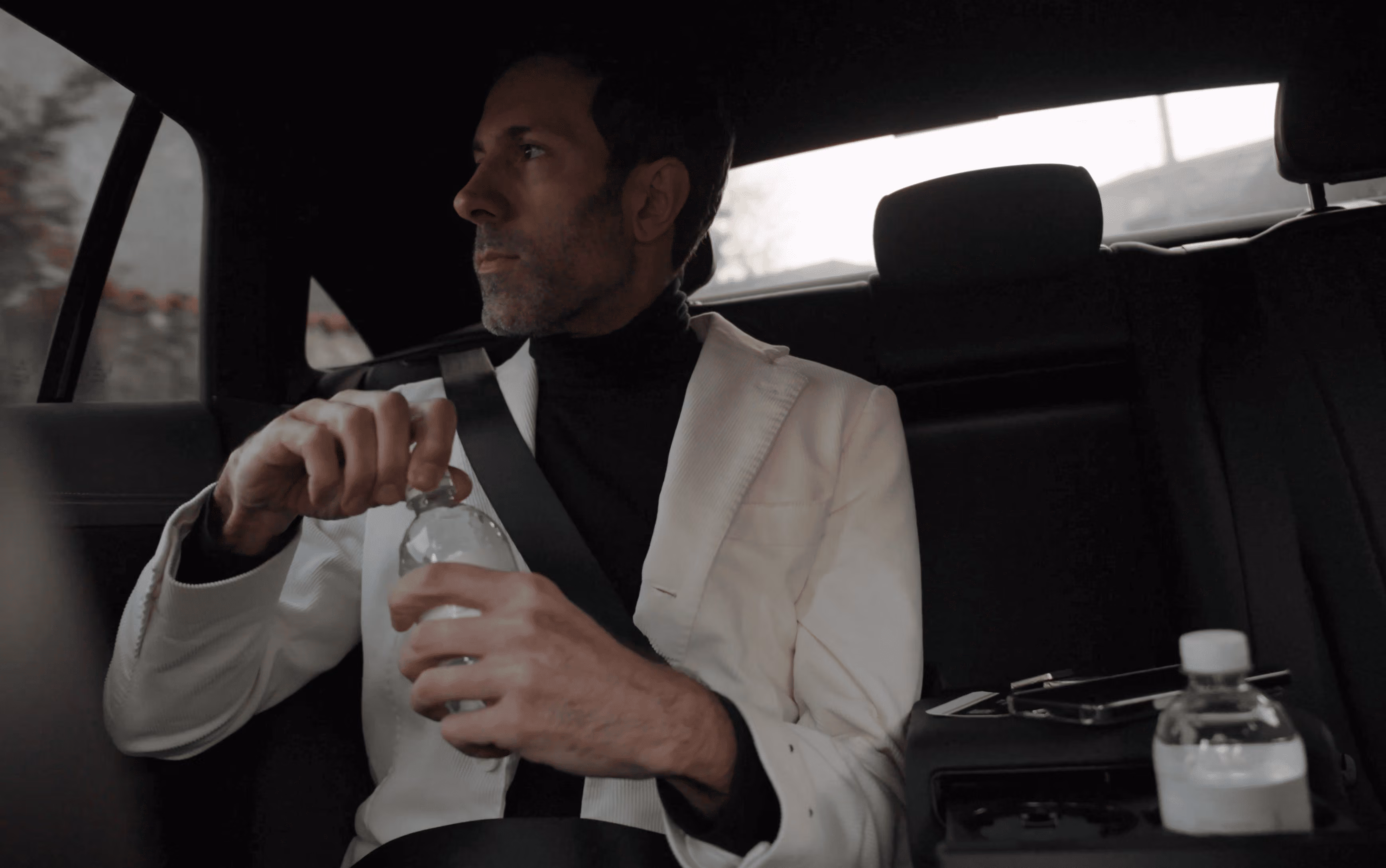 Rear passenger comfort inside the Mercedes EQE for quiet executive chauffeur travel