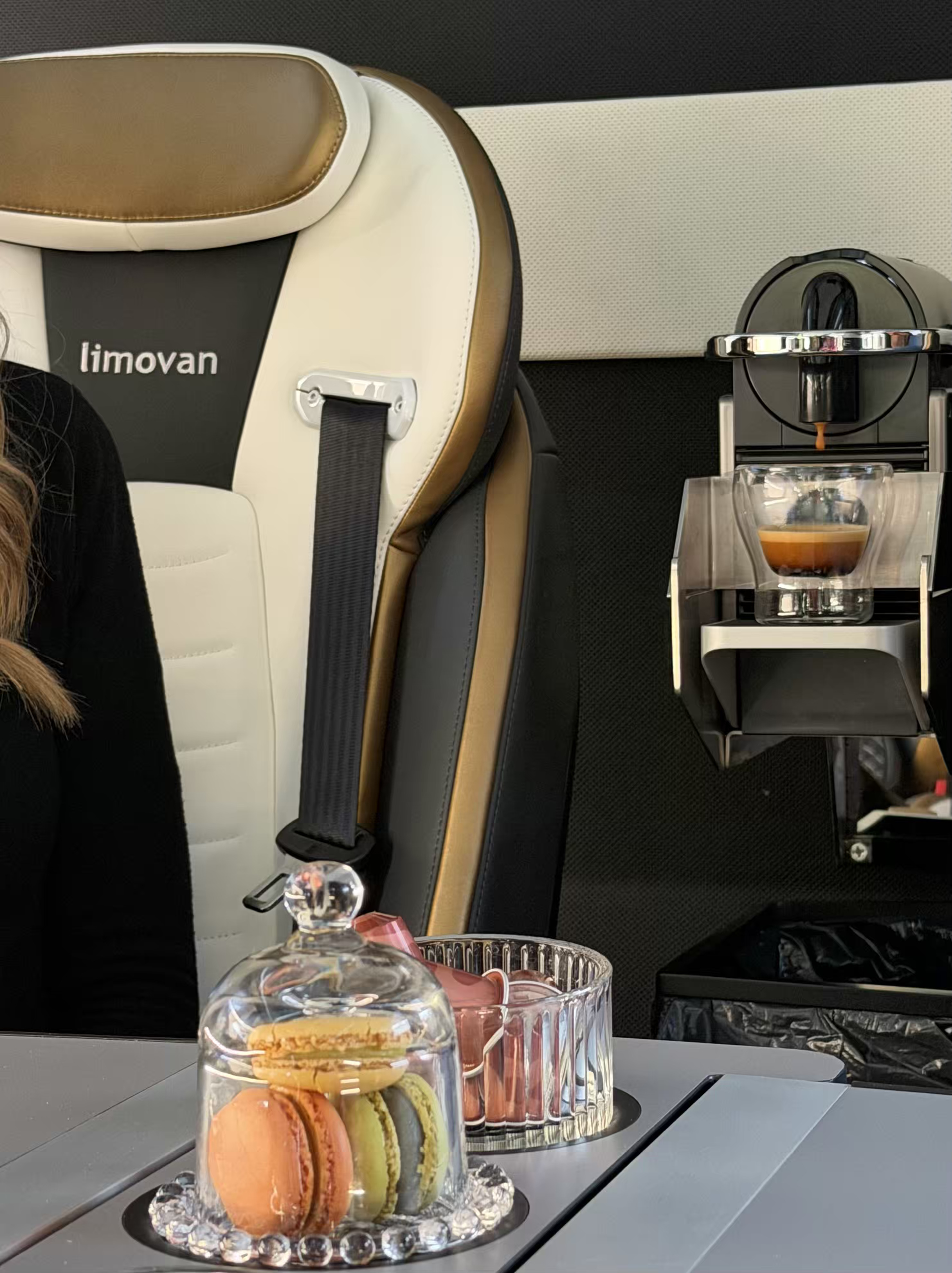 Passenger lounge view inside the Moveolux Limovan Black Edition for executive private transfers