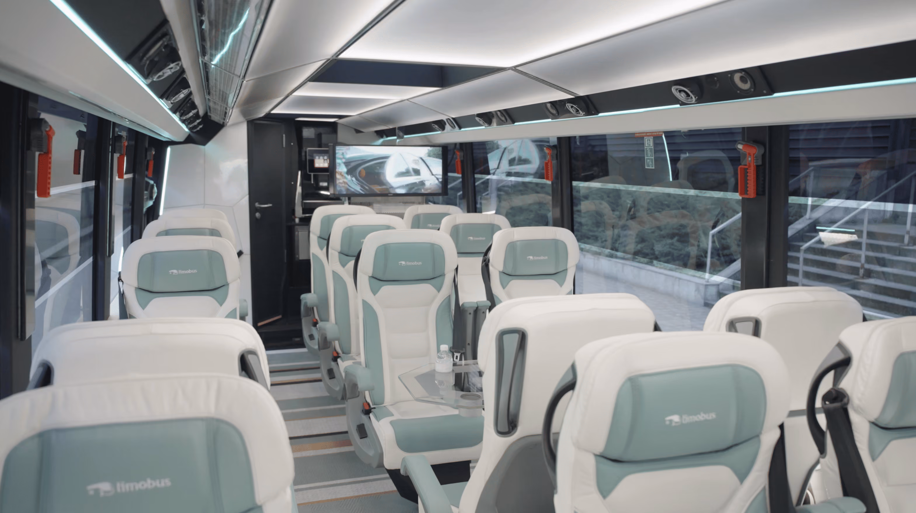 Lounge seating rows inside the Moveolux Limobus Seabreeze 18 for comfortable group travel