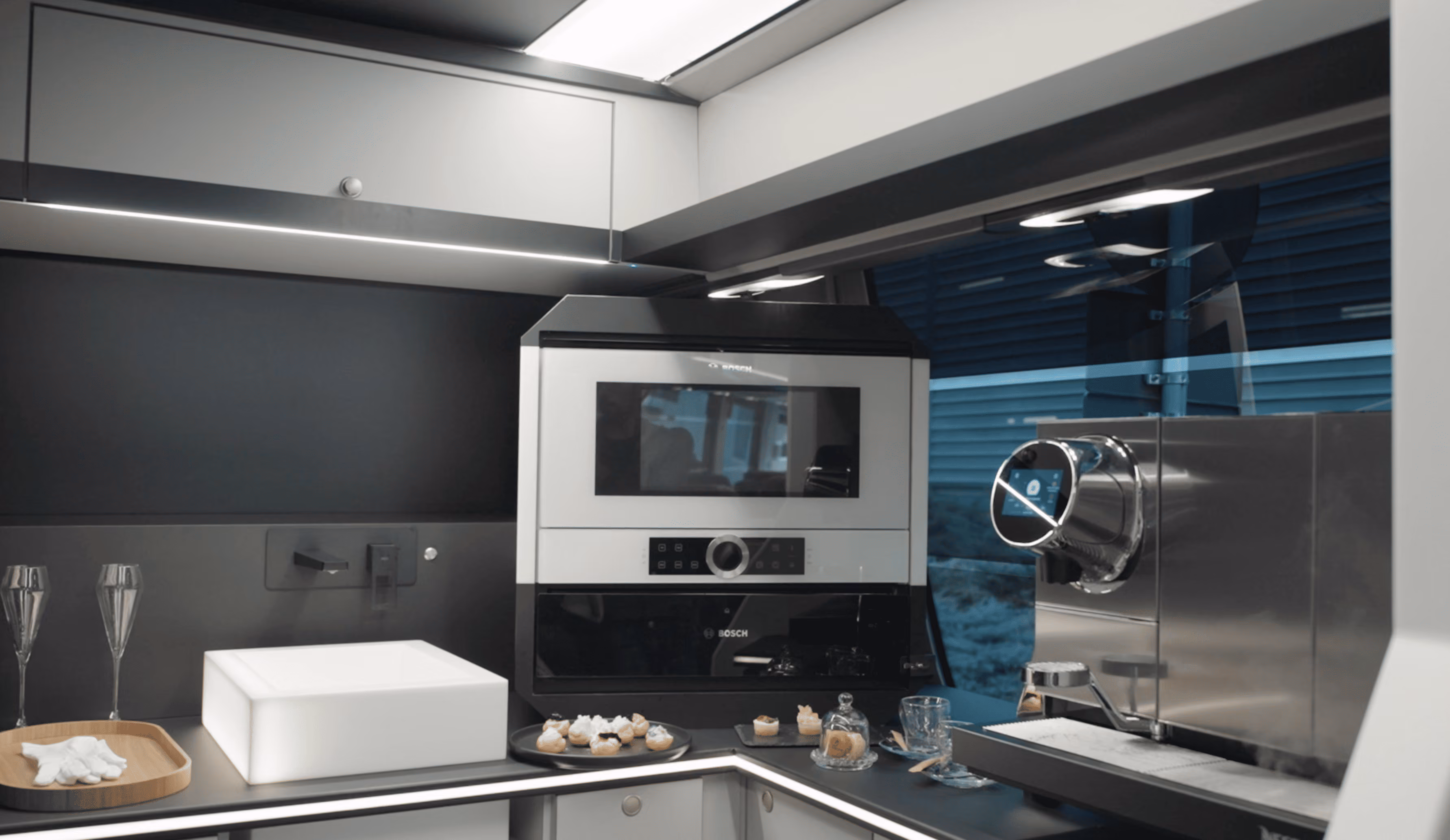 Bar area and screen inside the Moveolux Limobus Elements 20 for premium onboard hospitality