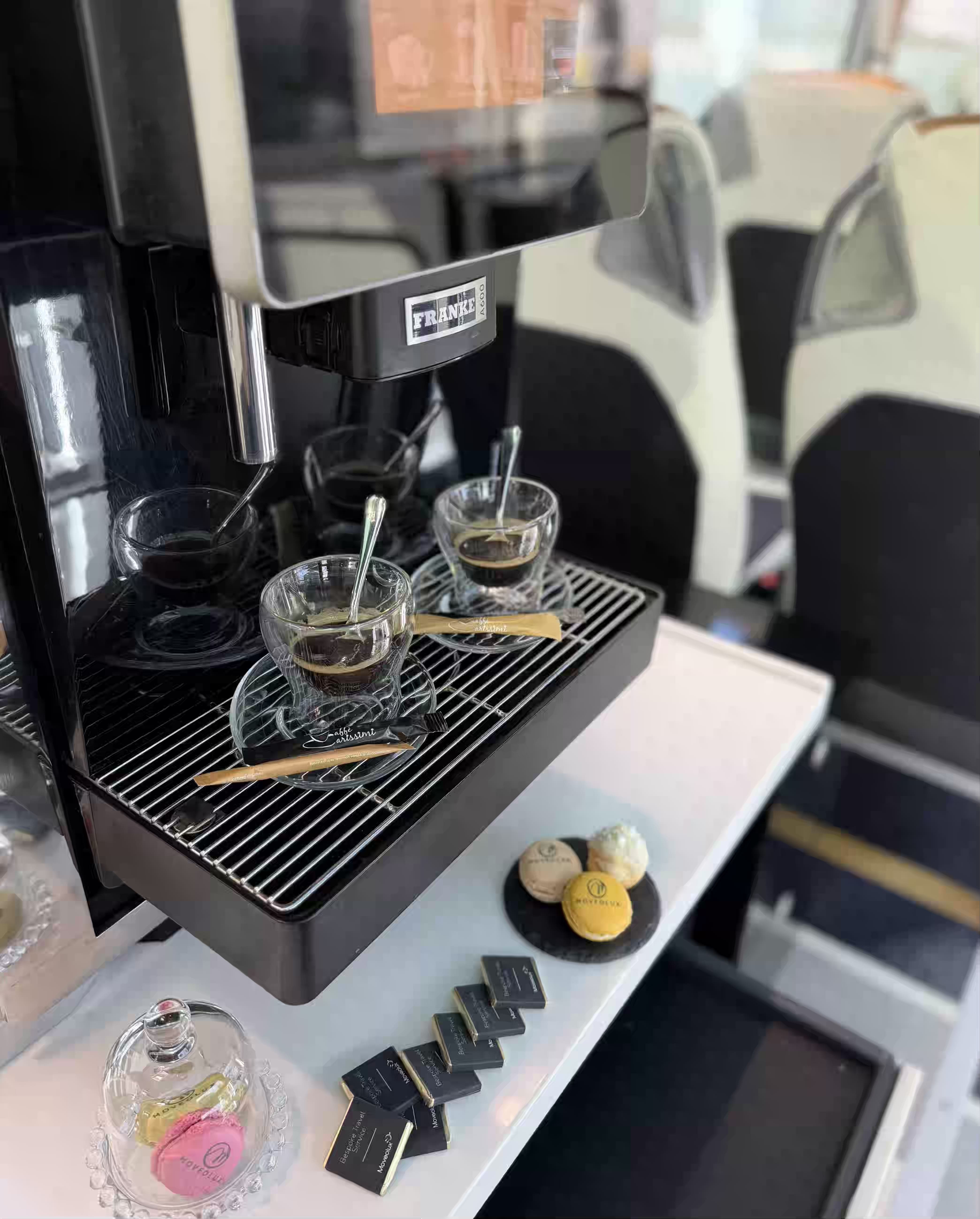 Lounge table view inside the Moveolux Limobus Individuals 28 for VIP hospitality travel