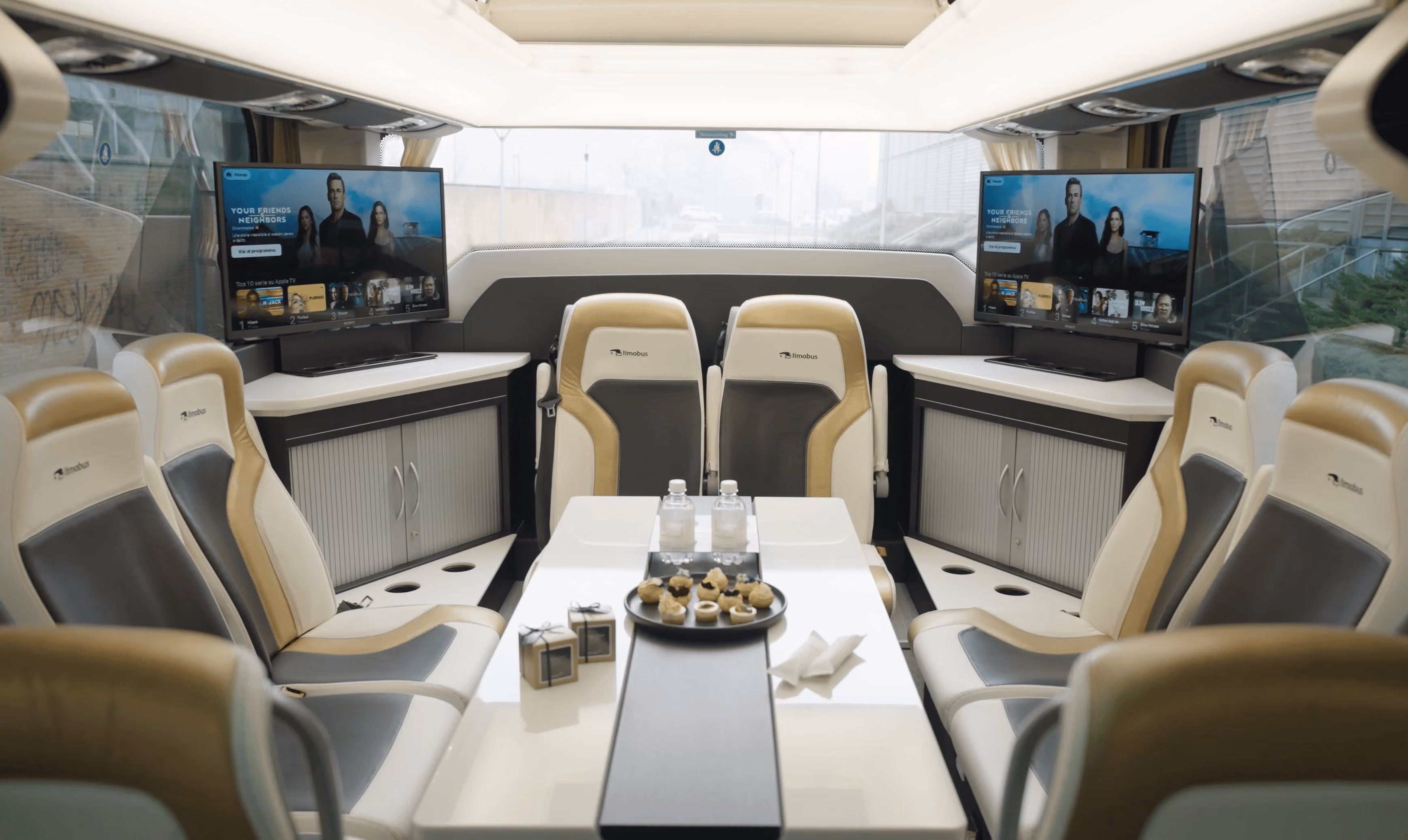 Luxury lounge layout inside the Moveolux Limobus Individuals 28 for large premium groups